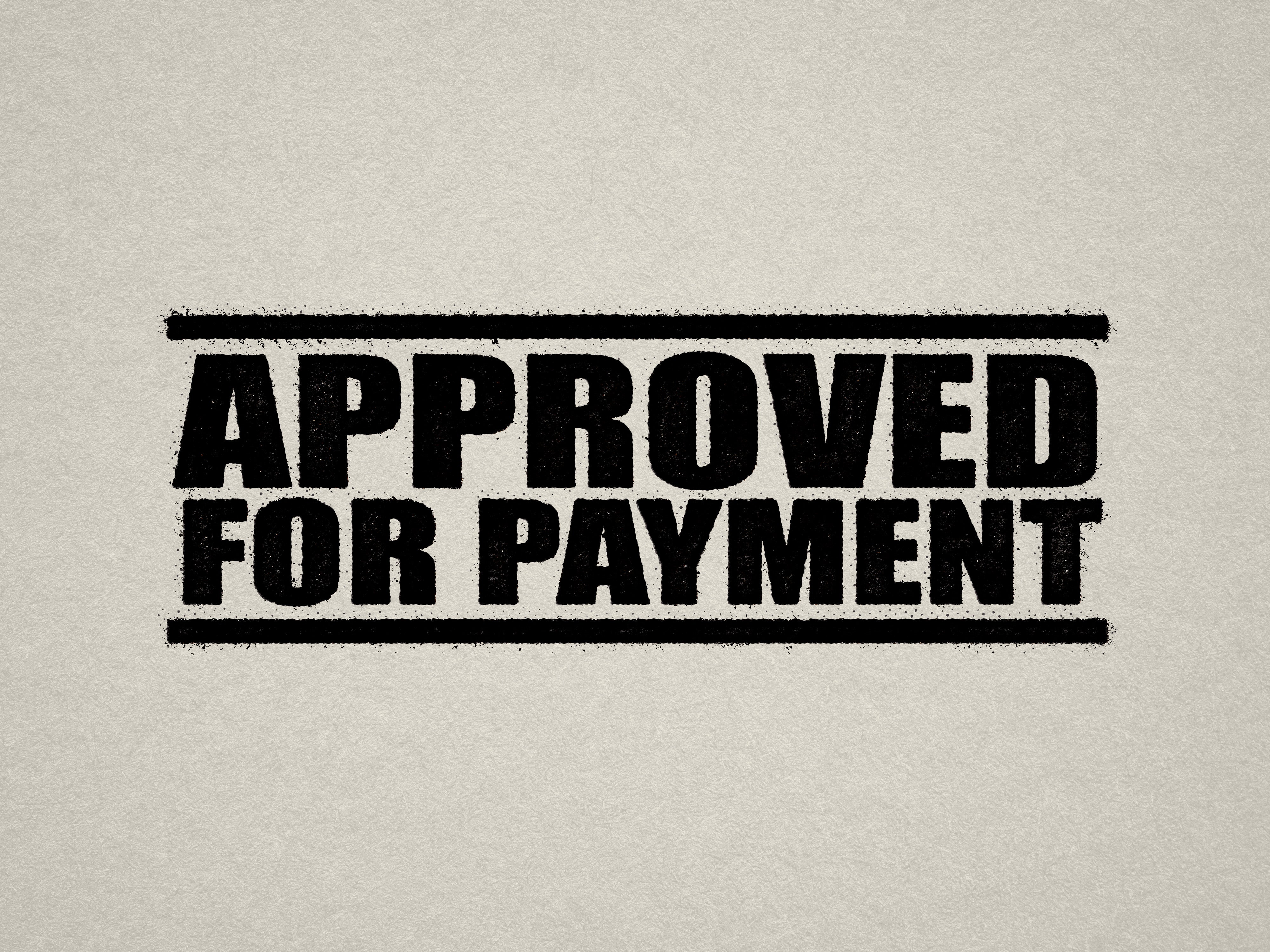 mock up design of 'Approved For Payment" rubber stamp black ink in paper background stampers hand stamp office business inventory documents