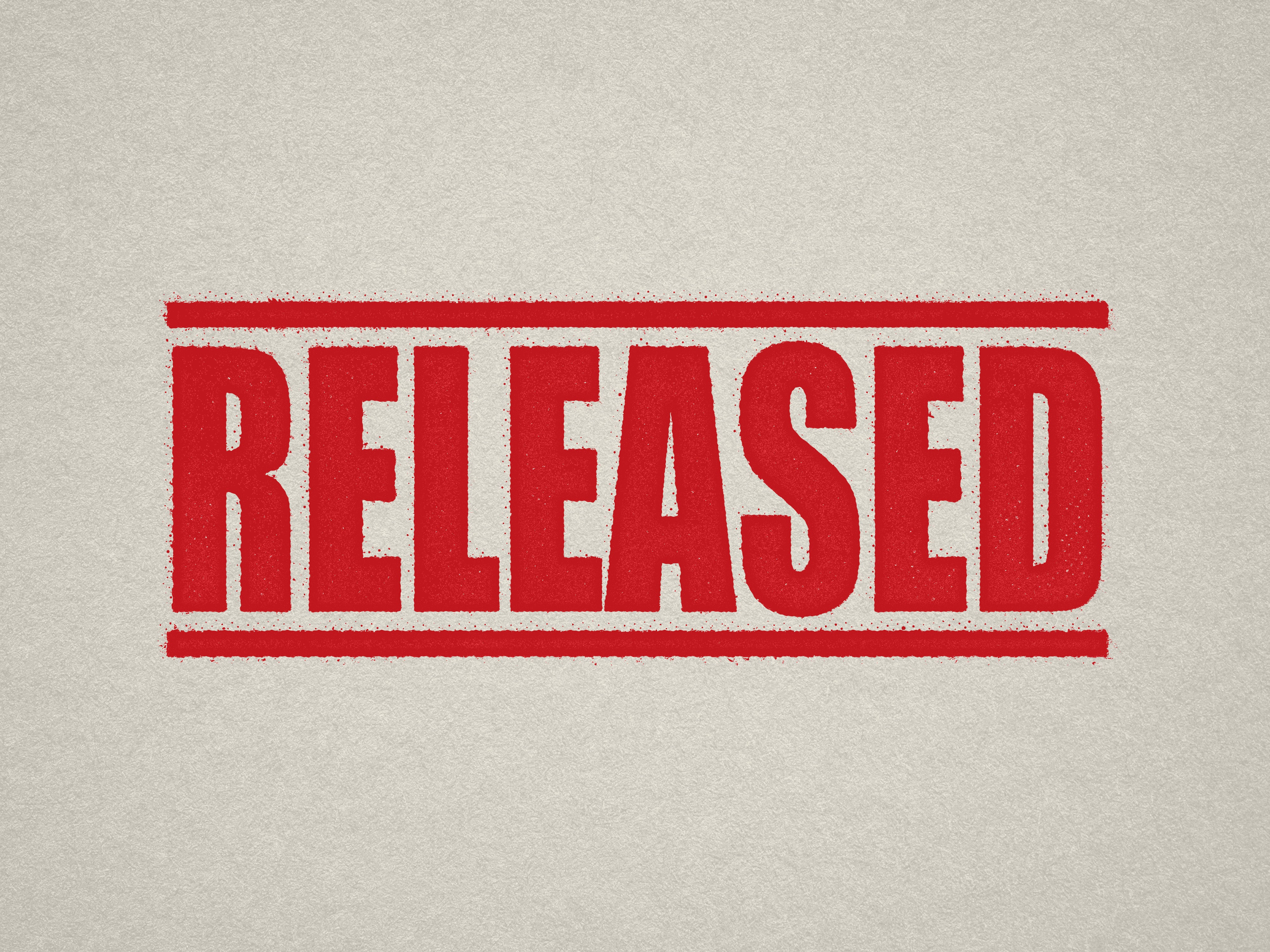 Readymade hand stamp "RELEASED" off the shelf design Red Ink