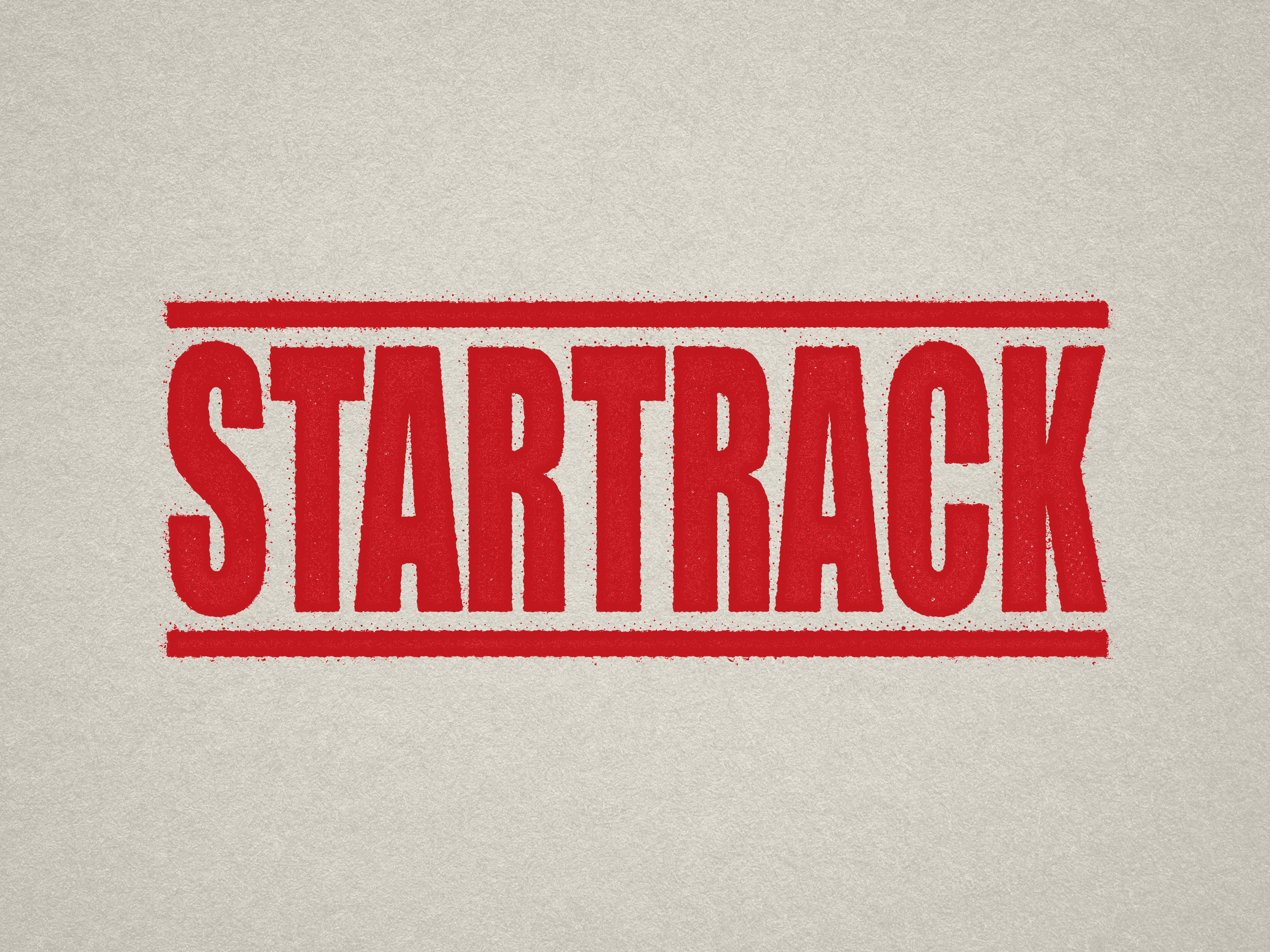 Bright red Startrack office stamp