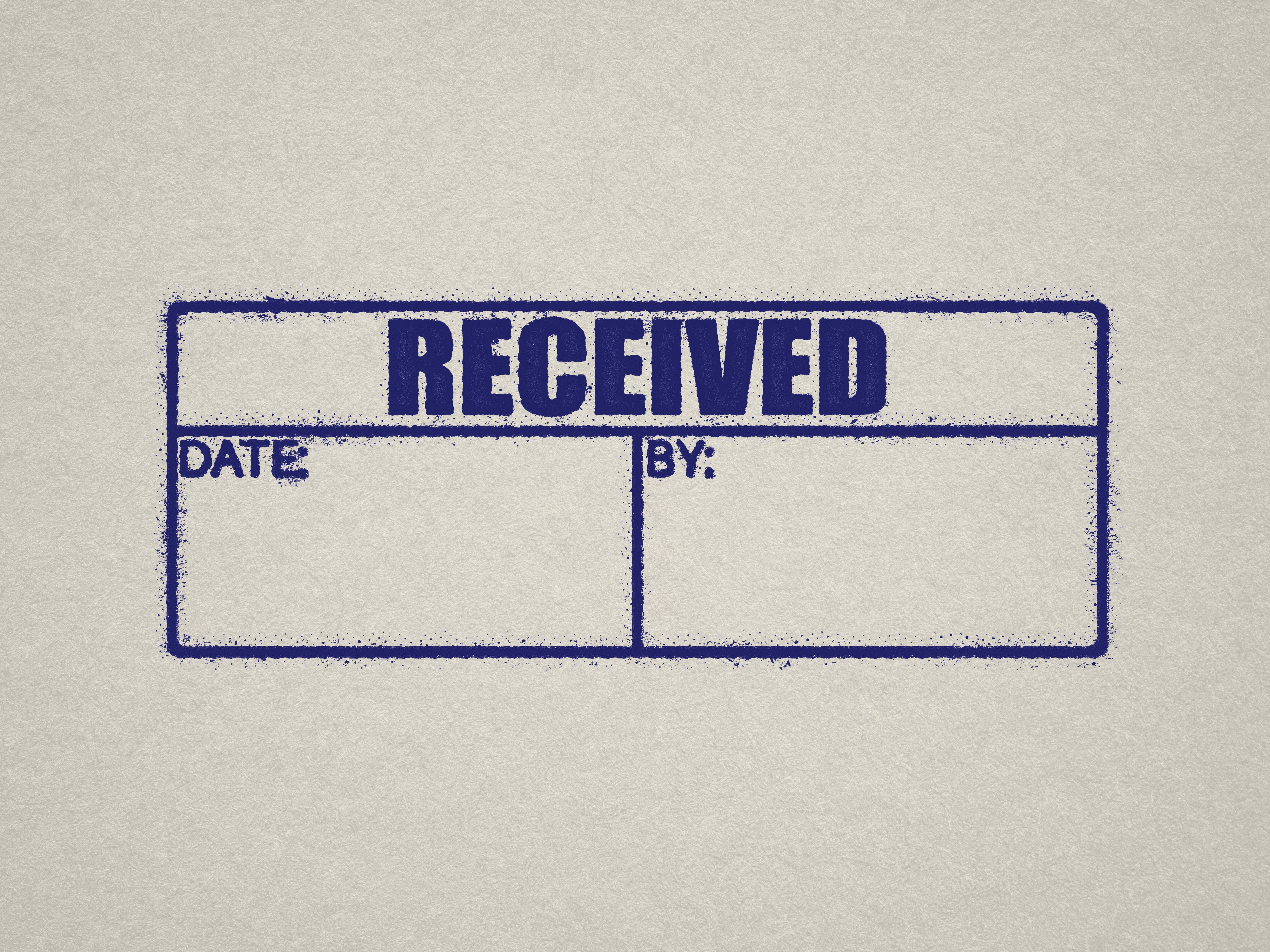 Received Date By Stamp table stamp Blue ink