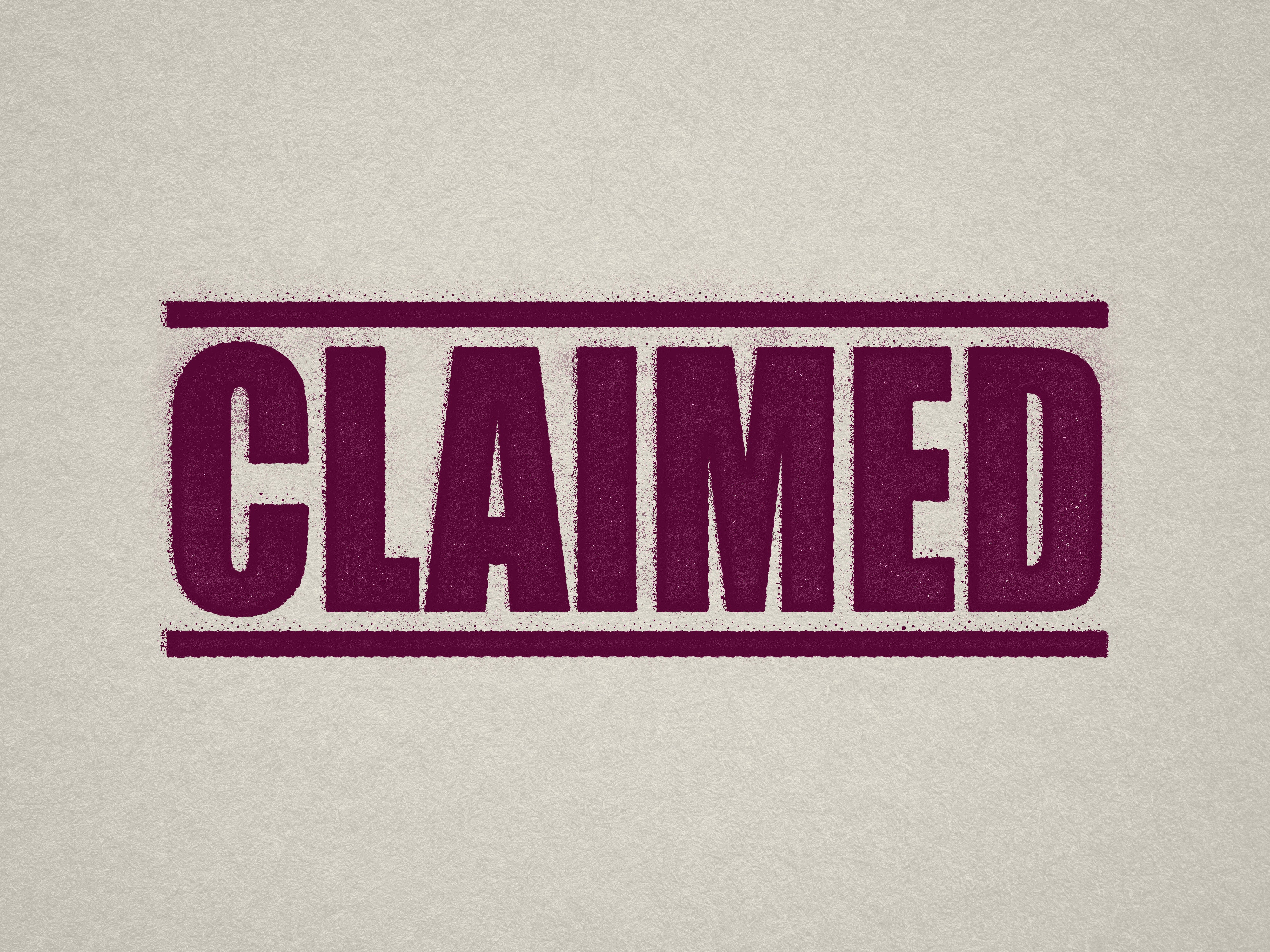 mock up design of 'Claimed' rubber stamp maroon ink in paper background stampers hand stamp office business inventory documents self inking prefill refillable stamps stamping