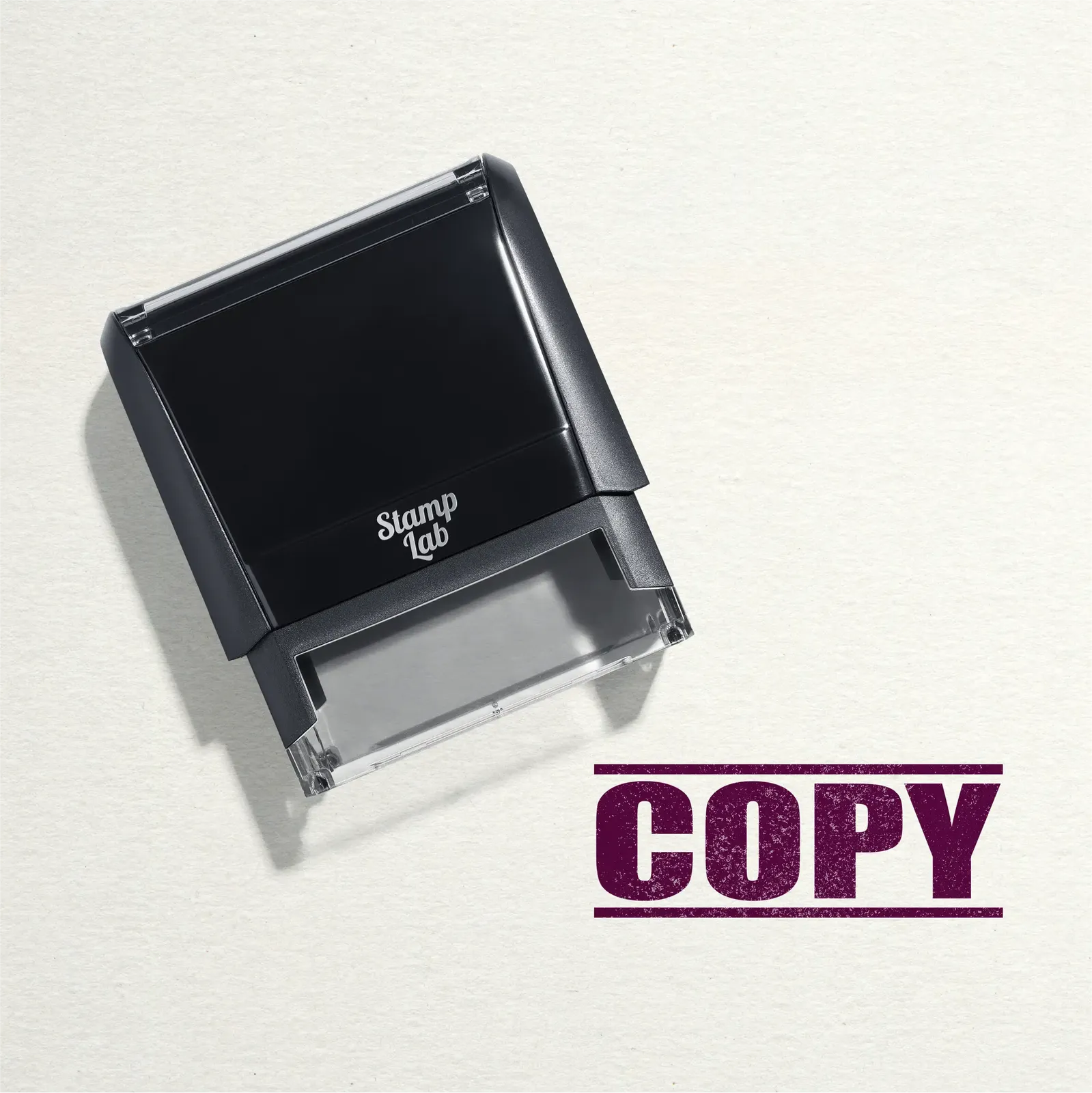 "Mock up design or lifestyle image of 'COPY' rubber stamp maroon ink in paper background stampers hand stamp office business inventory documents maroon
"