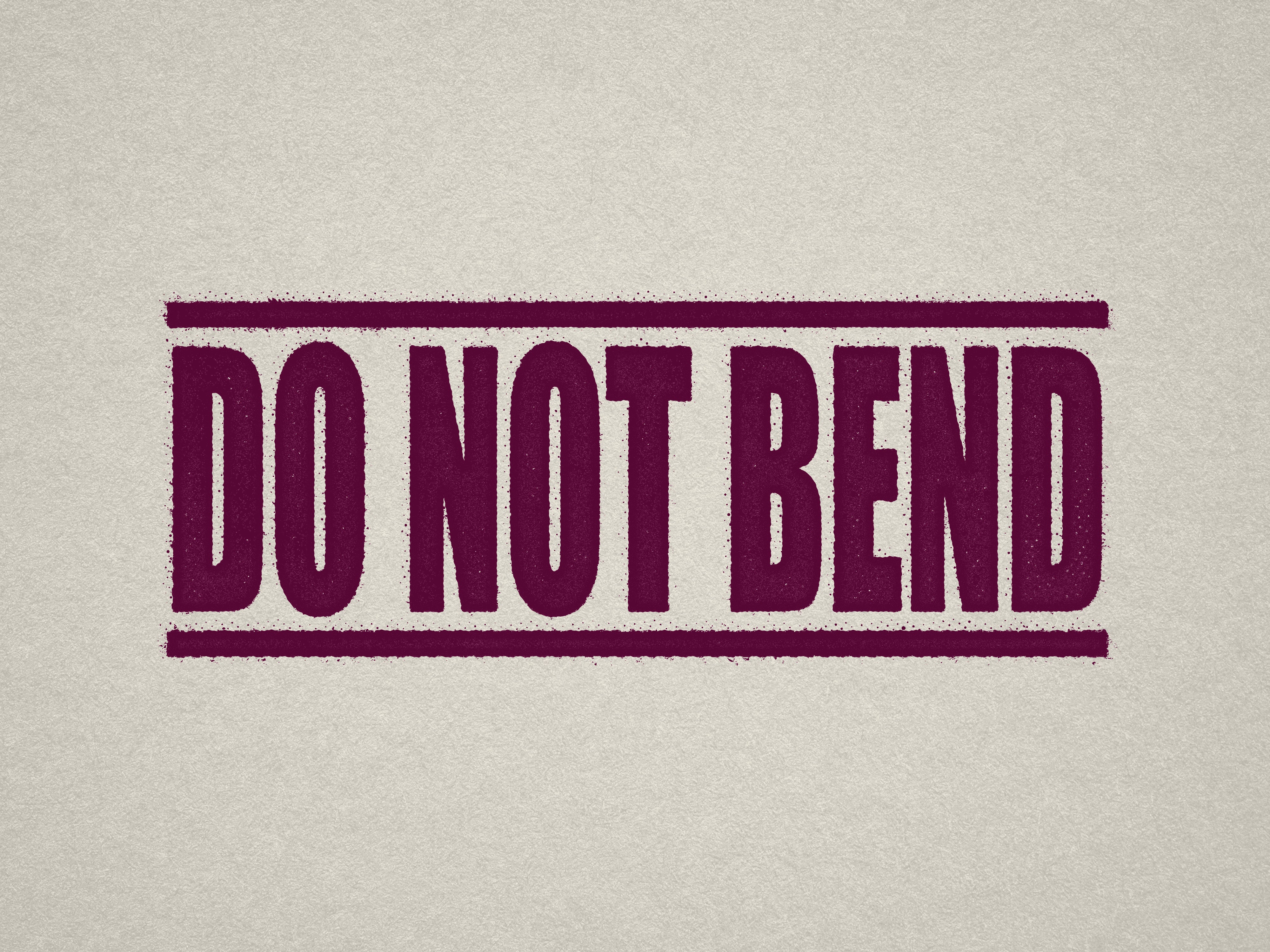 mock up design of DO NOT BEND rubber stamp maroon ink in paper background stampers hand stamp office business inventory documents