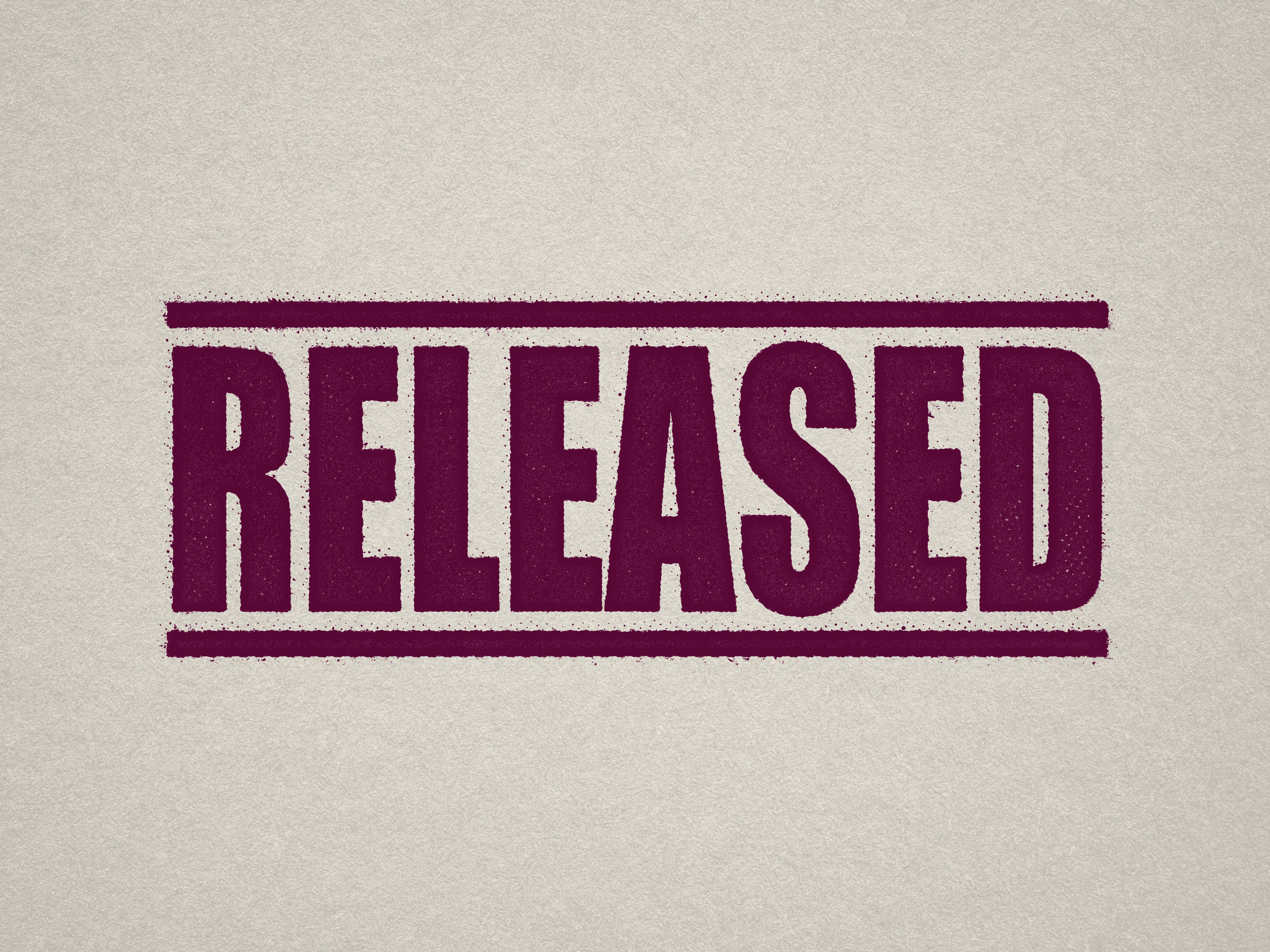 readymade 'RELEASED' stamp, Maroon ink