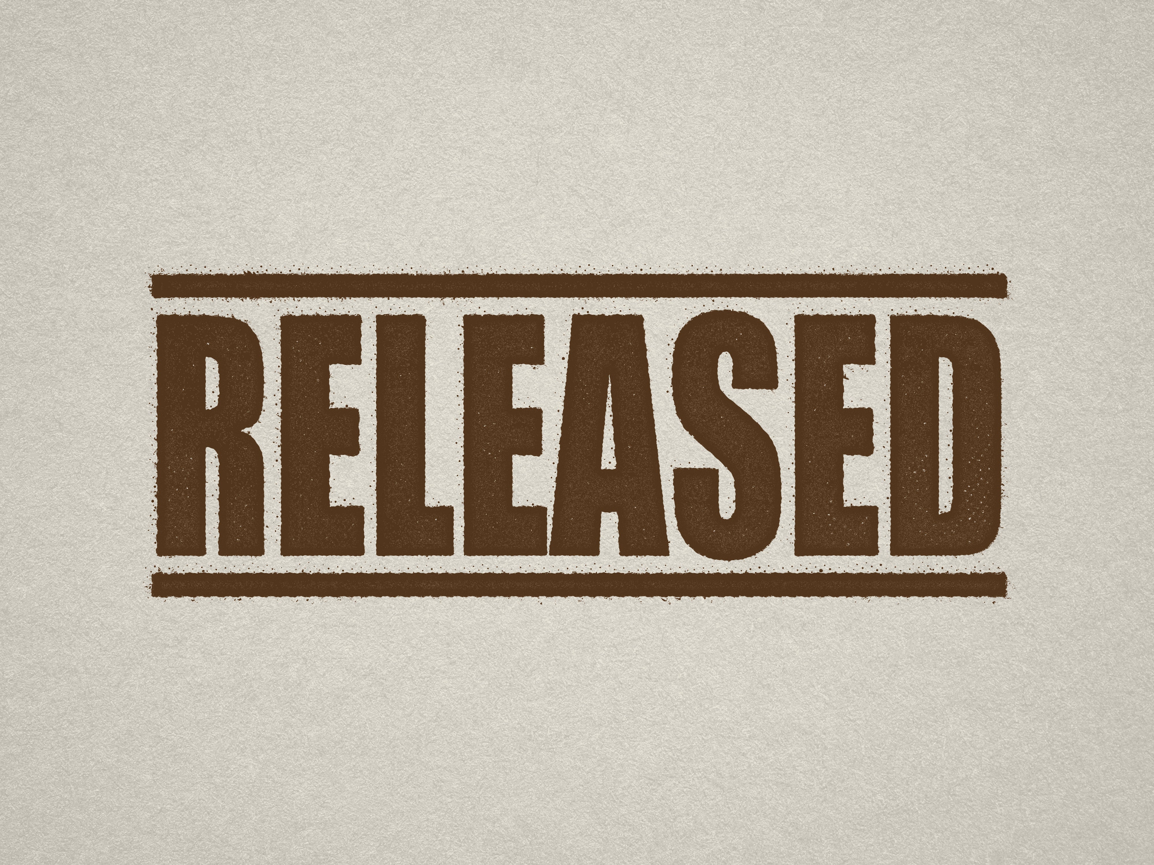 Brown self-inking rubber stamp, readymade design "RELEASED"