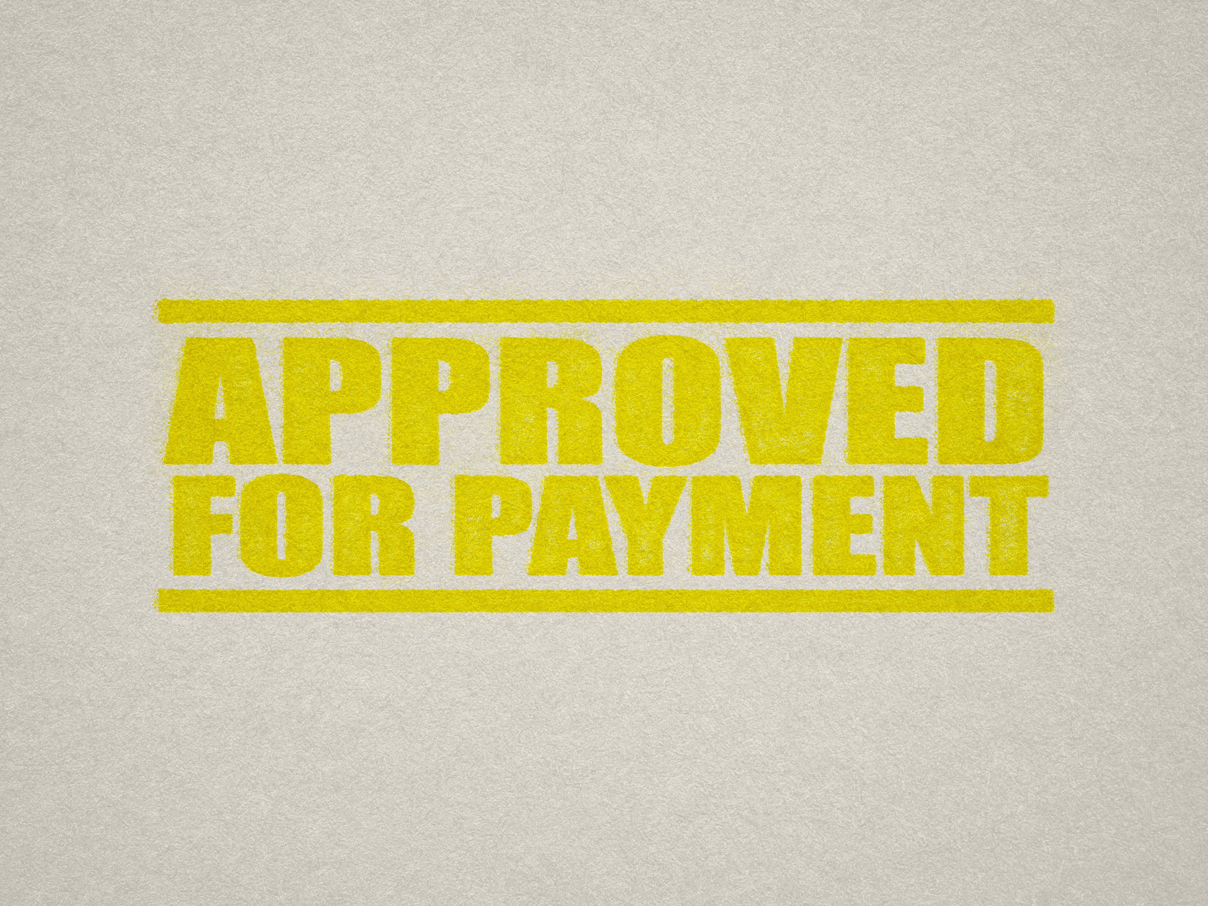 mock up design of 'Approved For Payment" rubber stamp yellow ink in paper background stampers hand stamp office business inventory documents