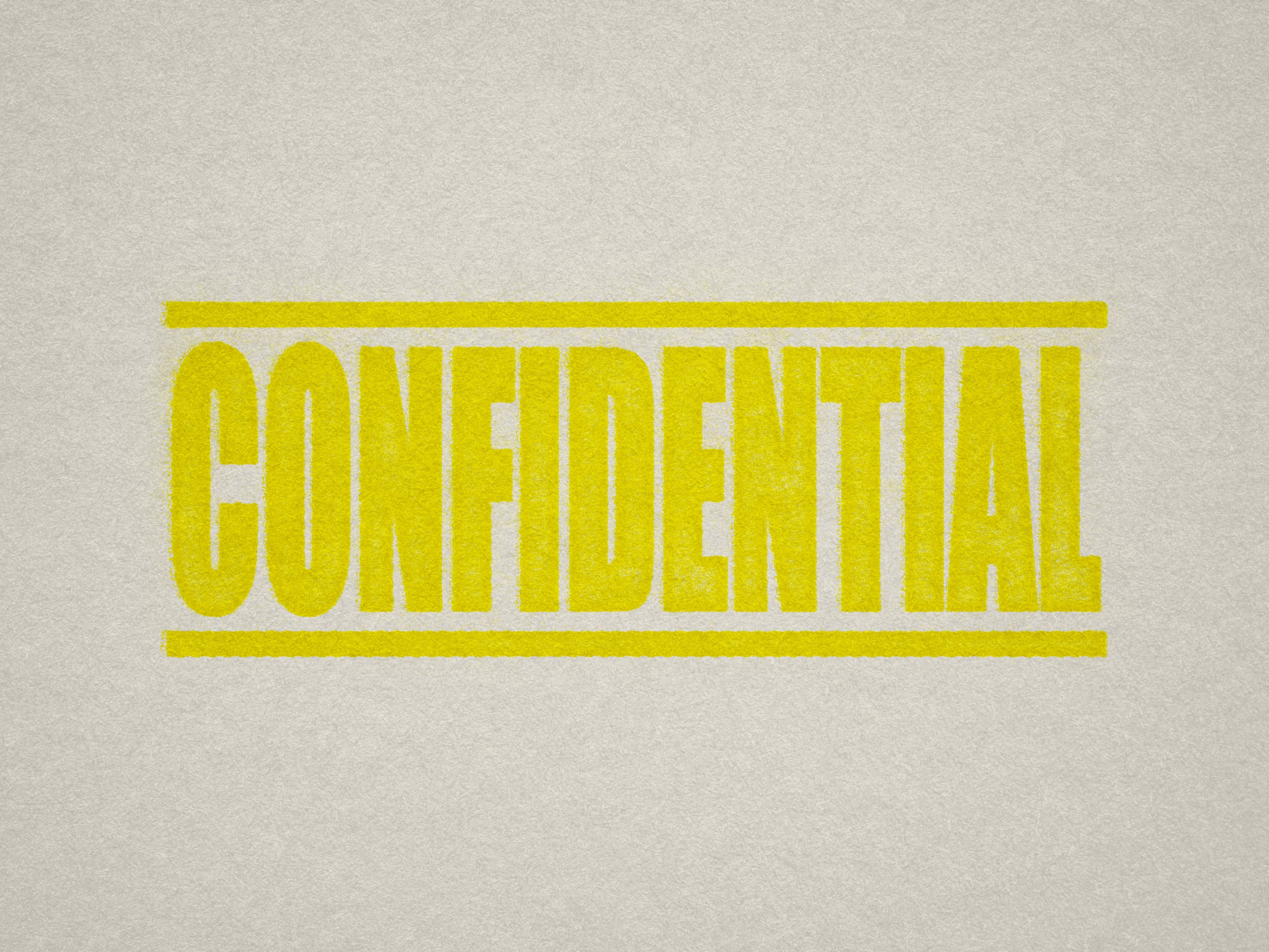 mock up design of 'Confidential' rubber stamp yellow ink in paper background stampers hand stamp office business inventory documents self inking prefill refillable stamps stamping