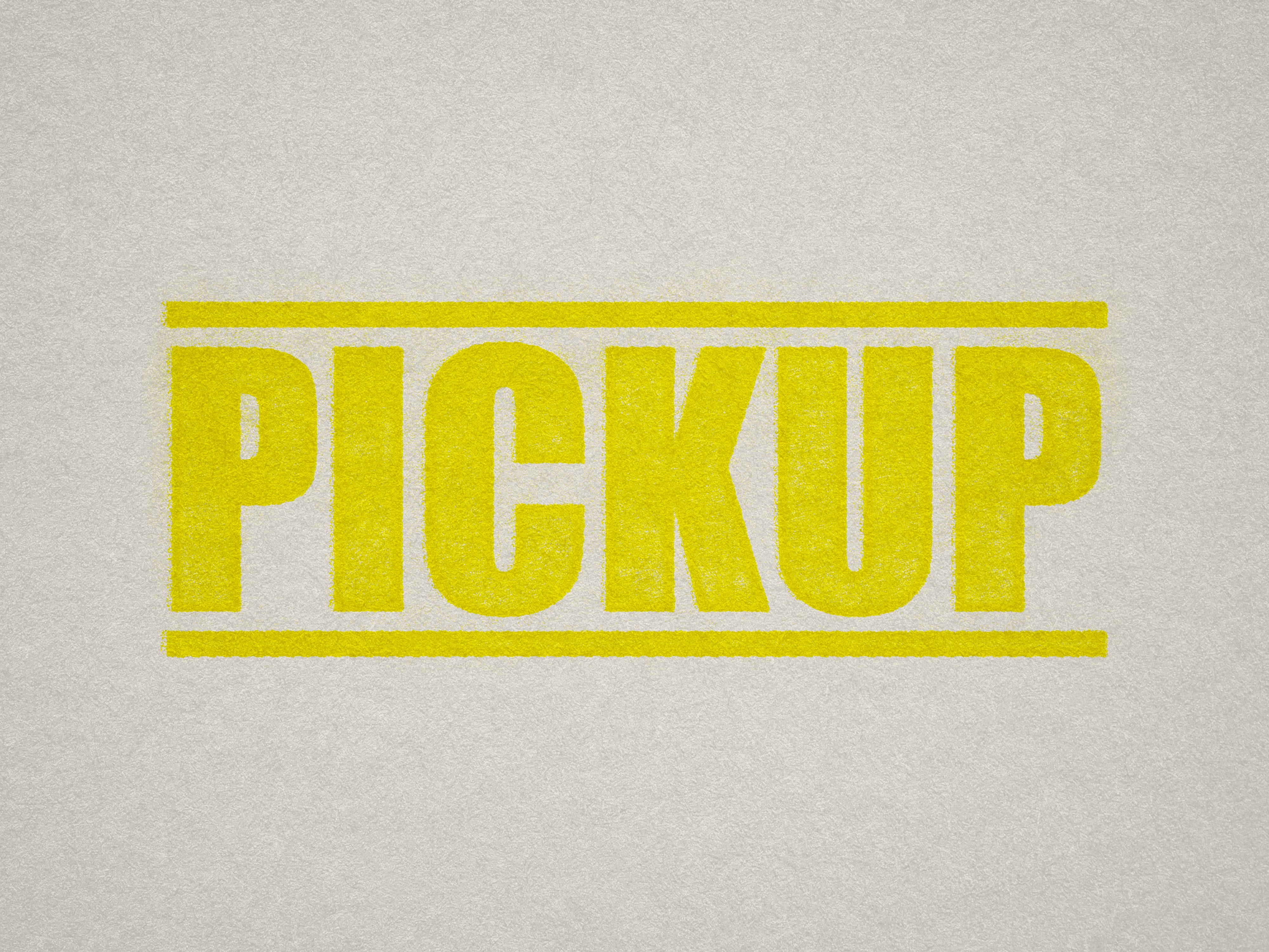 mock up design of 'Pickup" rubber stamp yellow ink in paper background stampers hand stamp office business inventory documents pick up