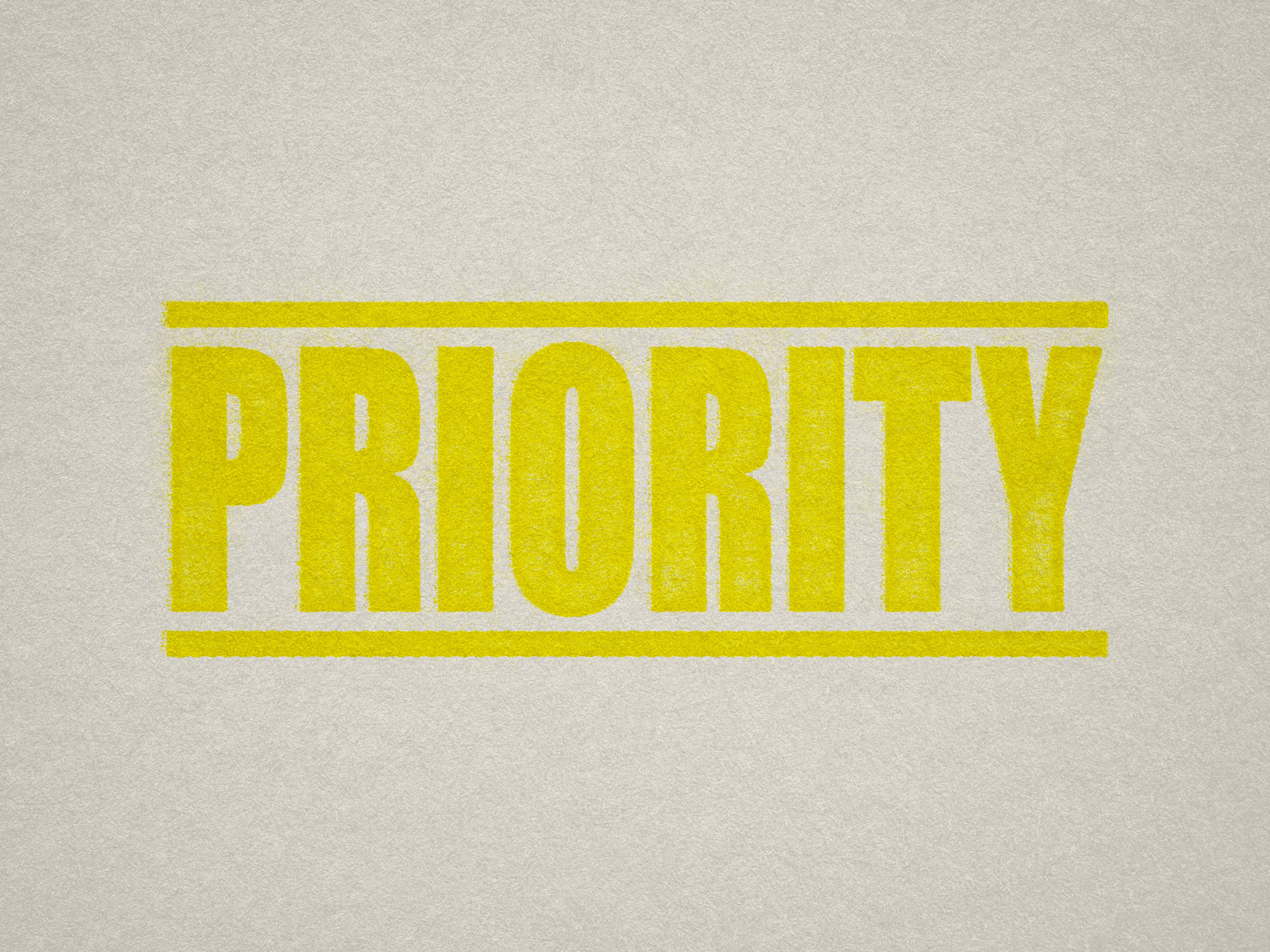 mock up design of 'Priority' rubber stamp yellow ink in paper background stampers hand stamp office business inventory documents self inking prefill refillable stamps stamping