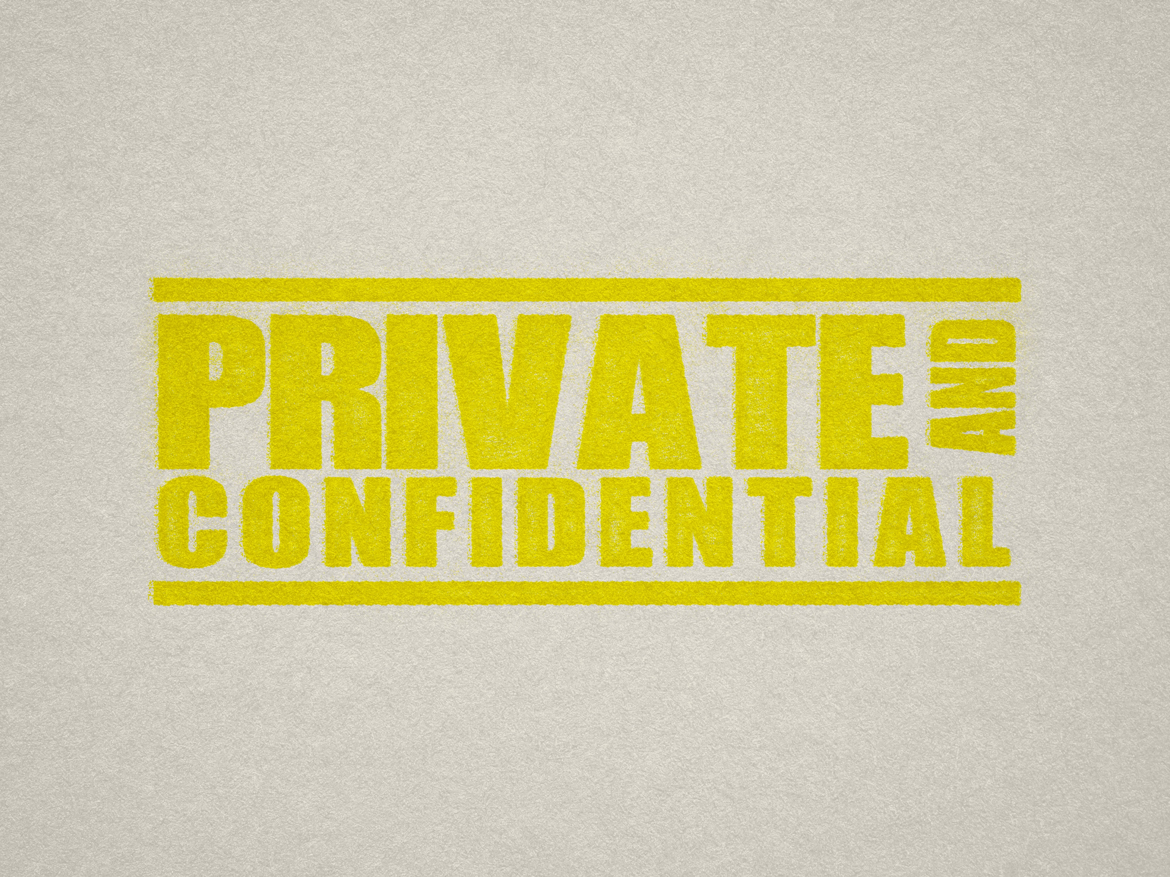 mock up design of 'Private and Confidential" rubber stamp yellow ink in paper background stampers hand stamp office business inventory documents