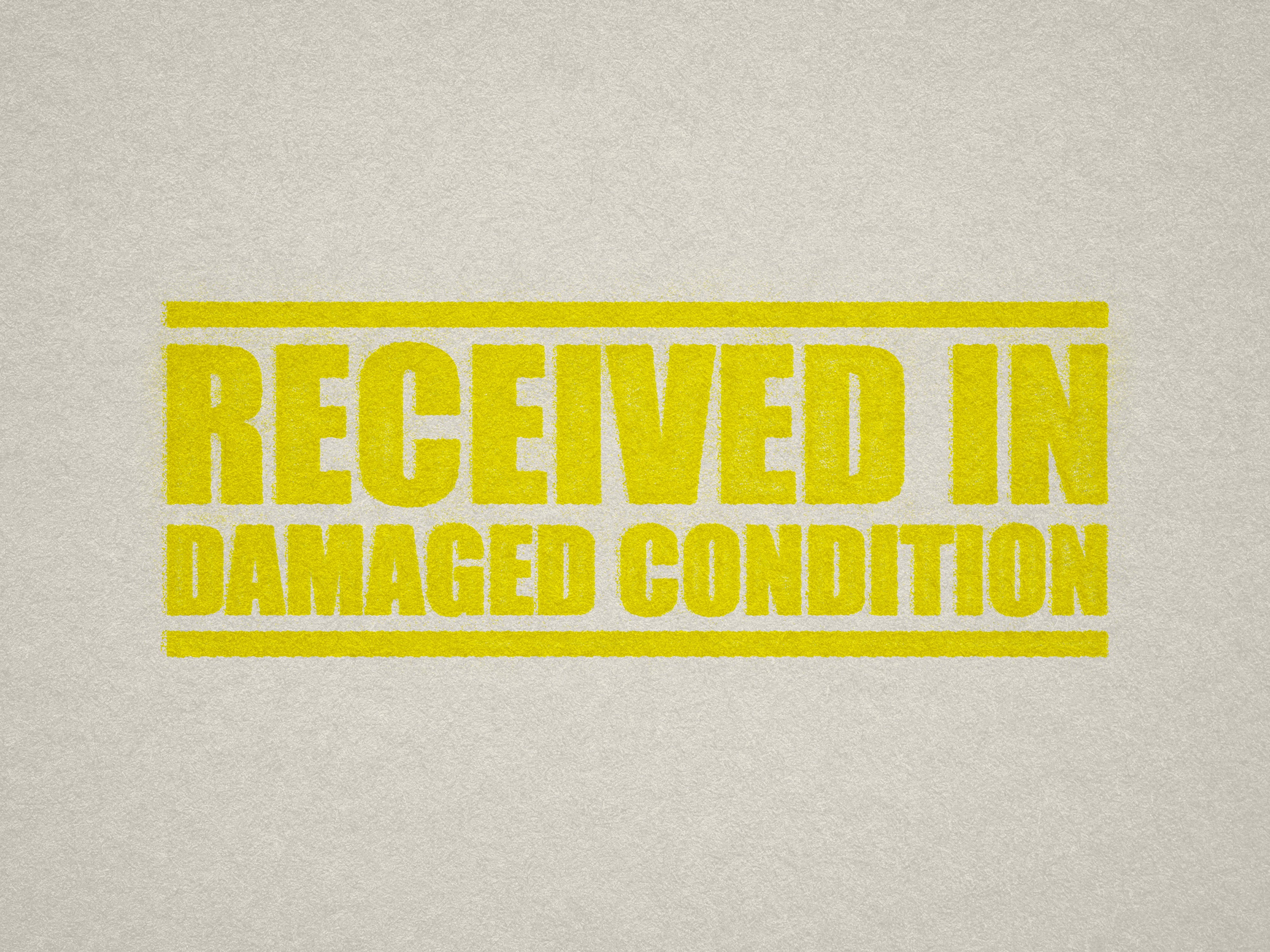 bright yellow RECEIVED IN DAMAGED CONDITION stamp Yellow ink