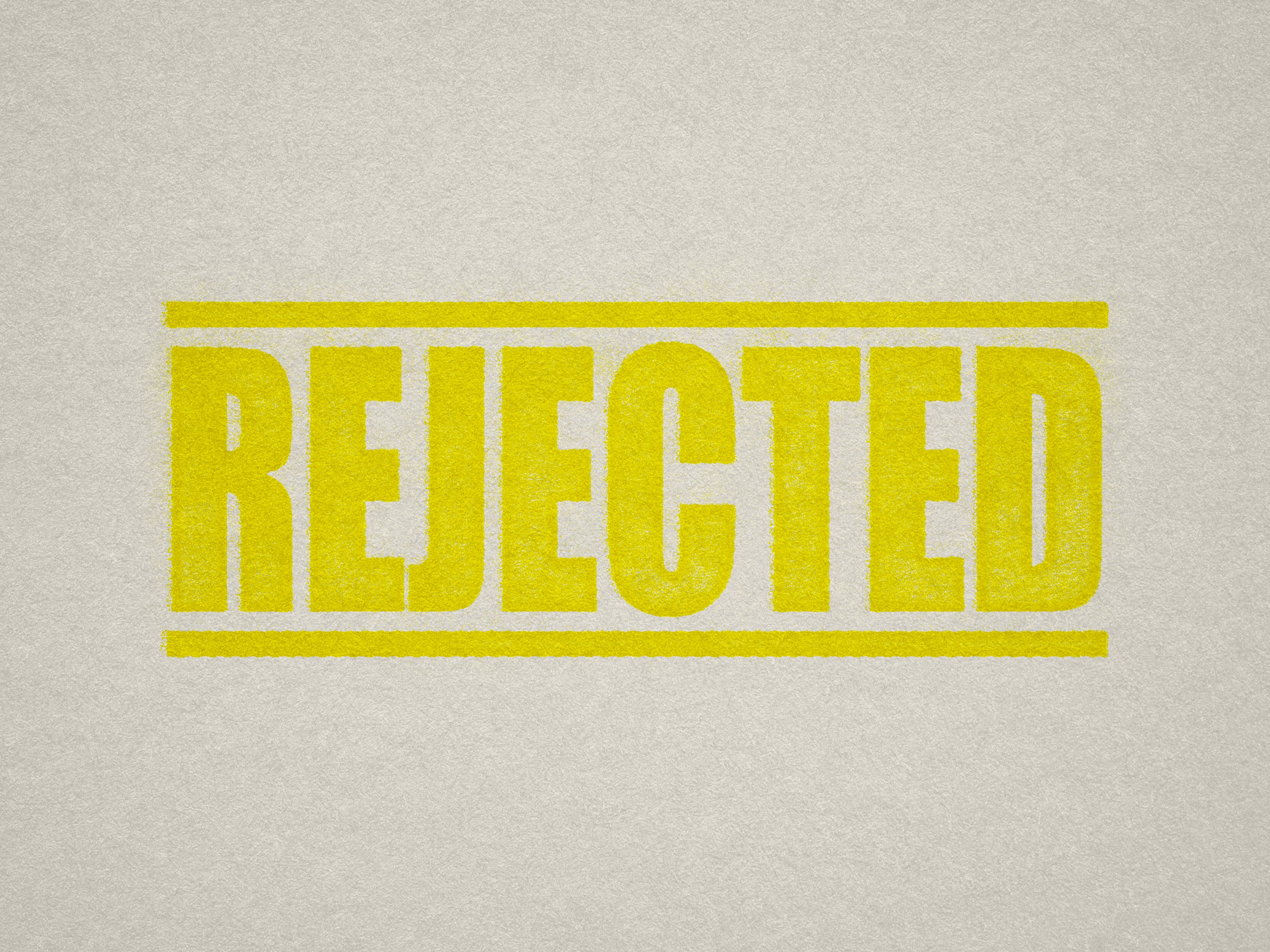 REJECTED stamp yellow ink