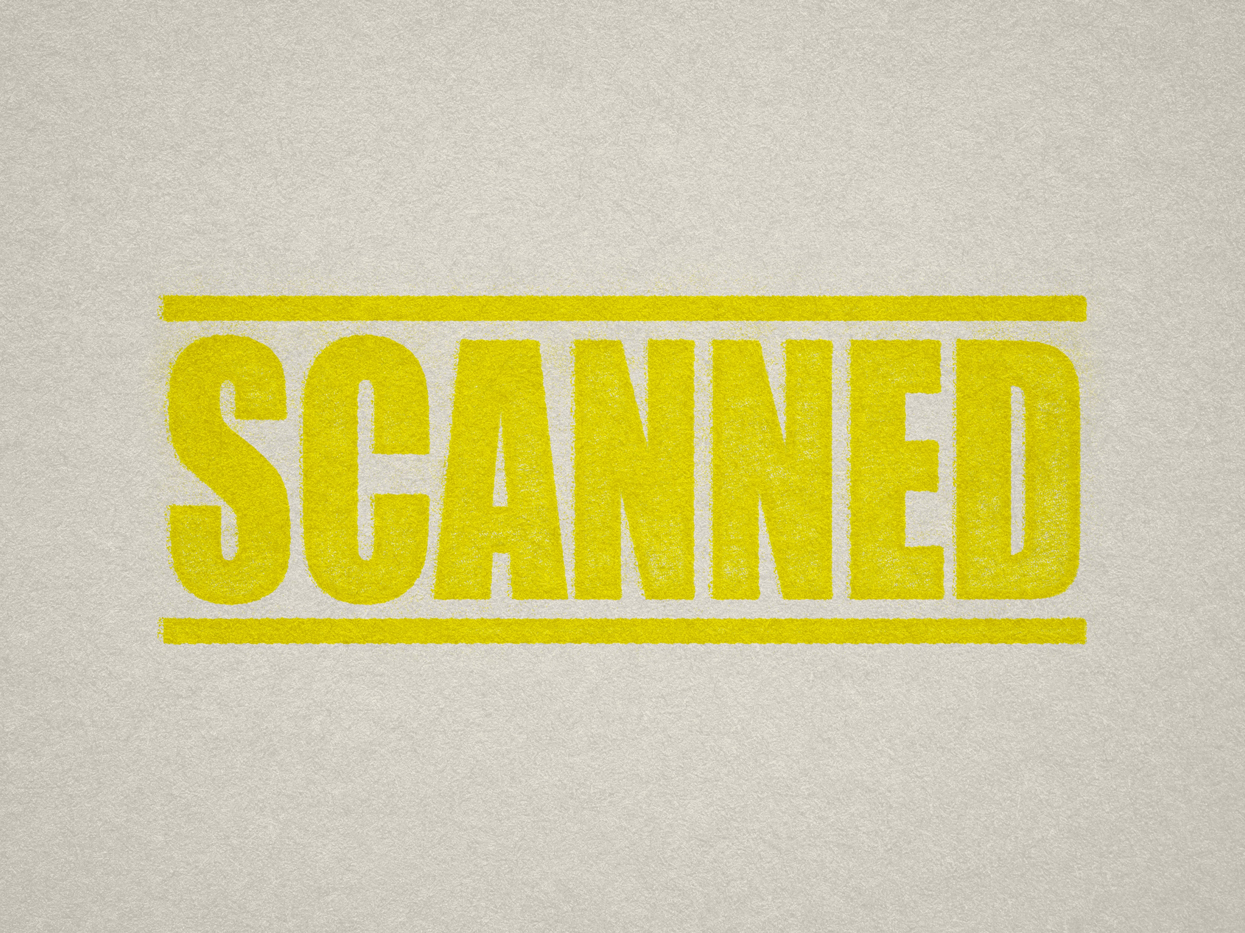 Mock up design or lifestyle image of 'SCANNED' rubber stamp yellow ink in paper background stampers hand stamp office business inventory documents self inking prefill refillable stamps stamping