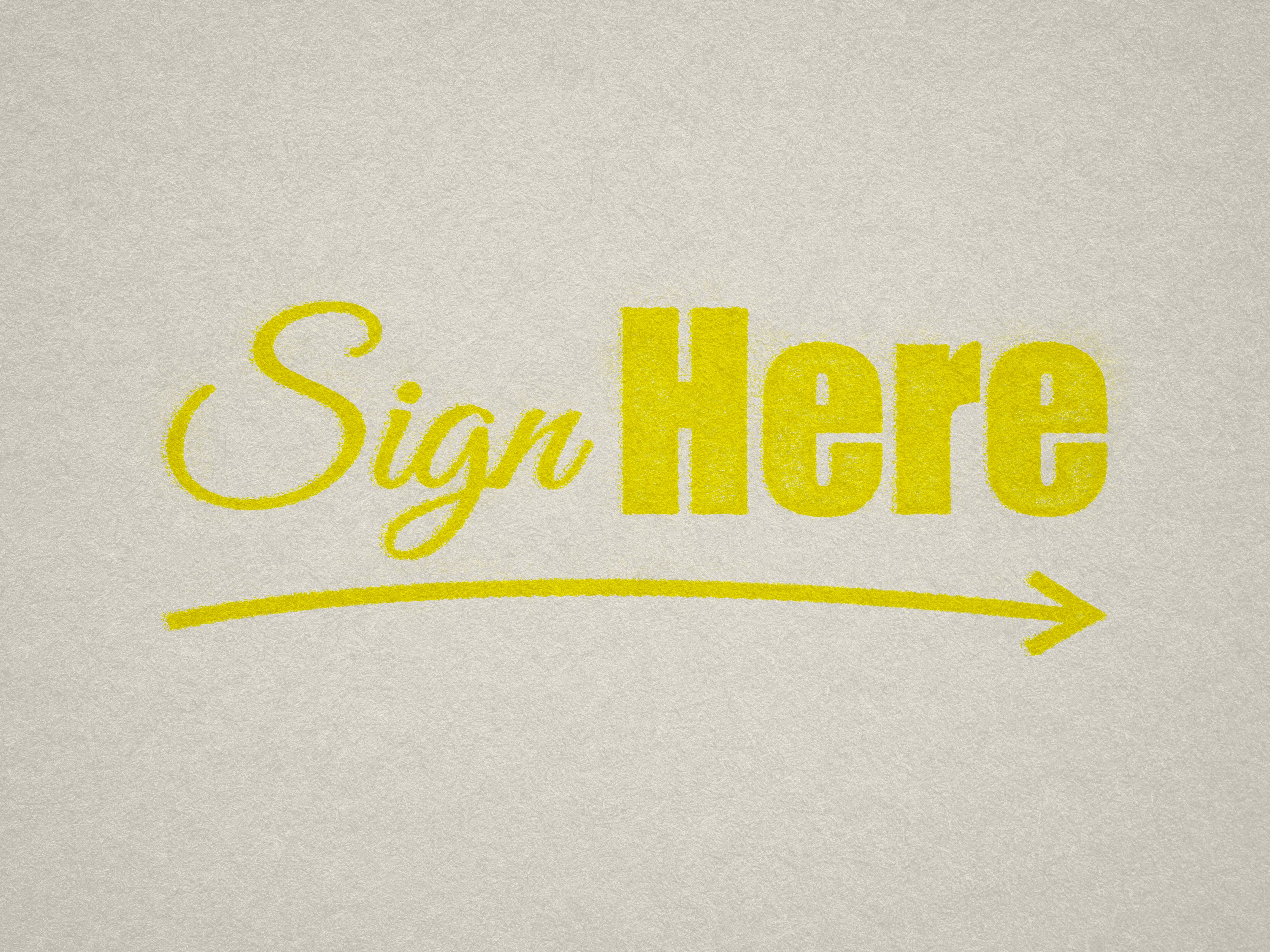 bright yellow Sign Here rubber stamp right hand arrow