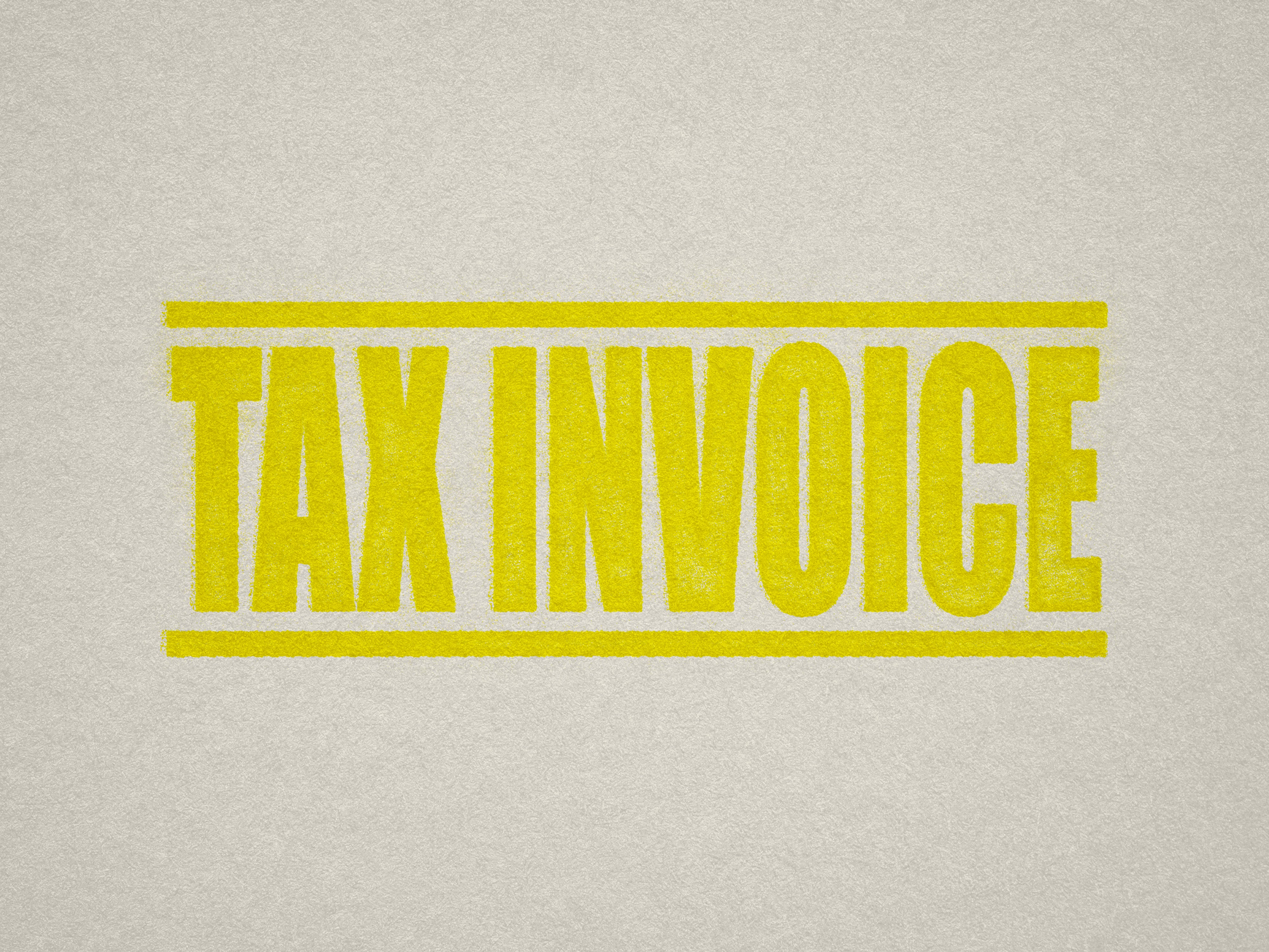 mock up design of 'Tax Invoice' rubber stamp yellow ink in paper background stampers hand stamp office business inventory documents self inking prefill refillable stamps stamping