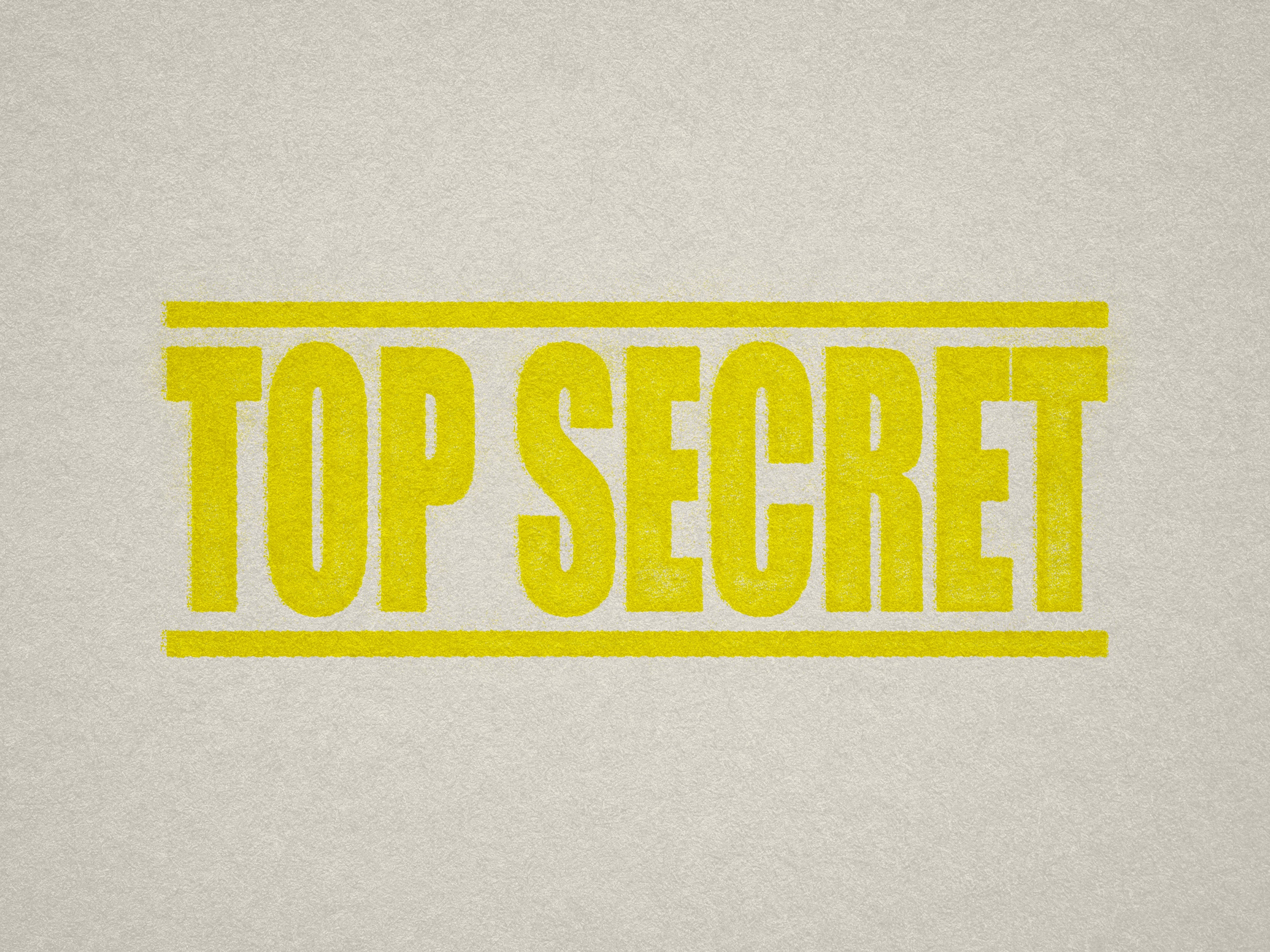 yellow Top Secret stamp design