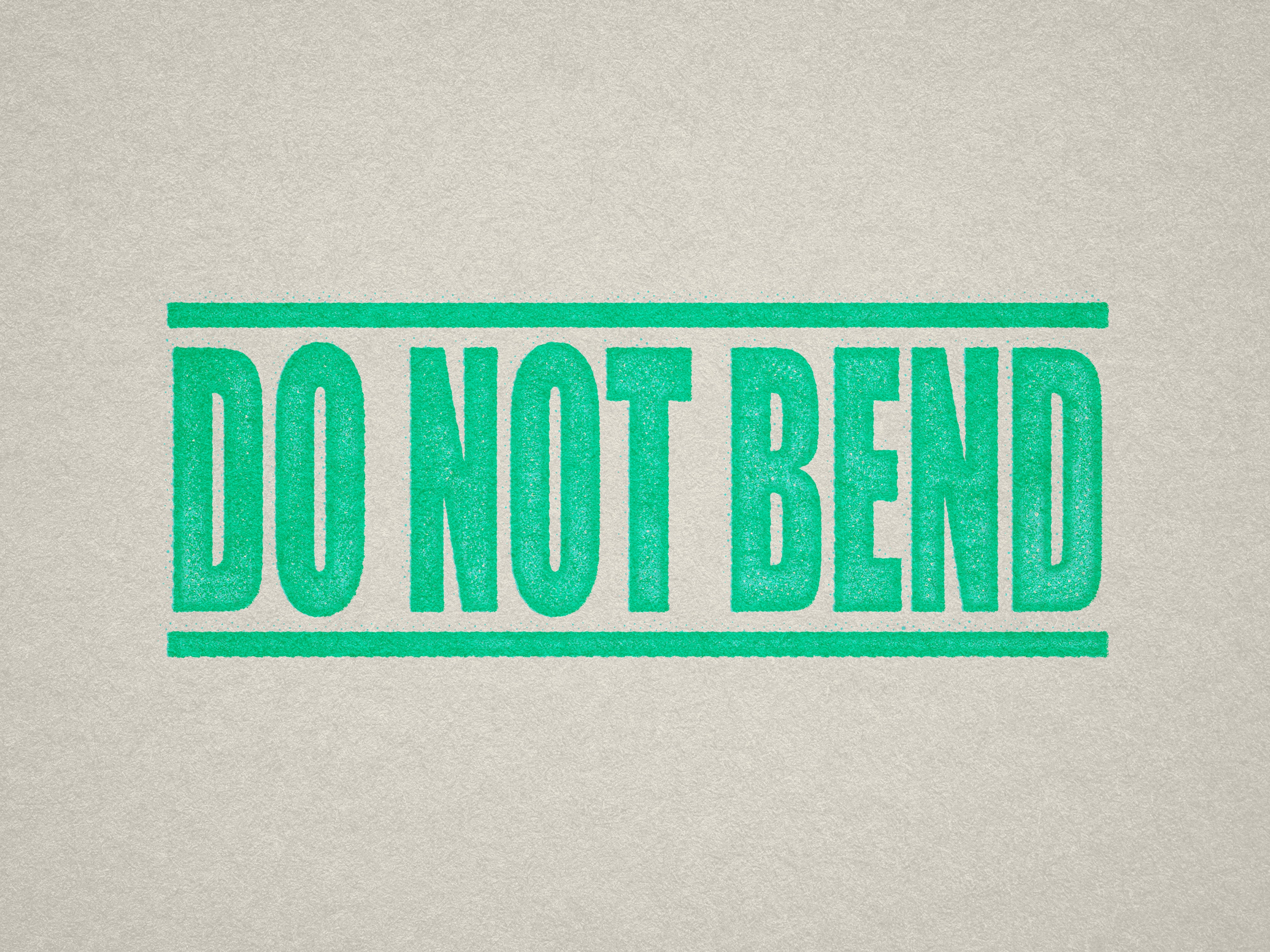 mock up design of DO NOT BEND rubber stamp mint ink in paper background stampers hand stamp office business inventory documents