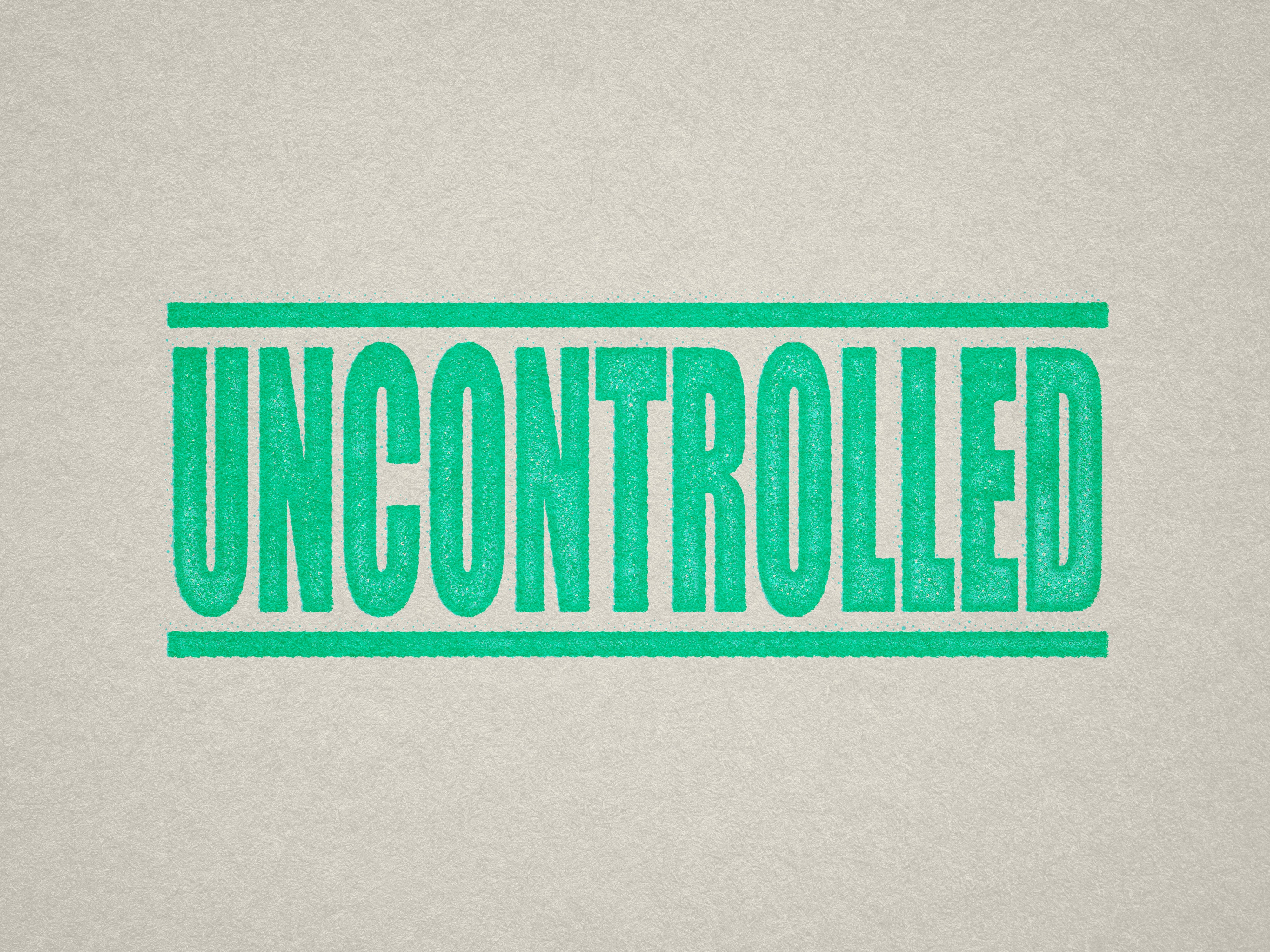 Mock up design or lifestyle image of 'UNCONTROLLED' rubber stamp mint ink in paper background stampers hand stamp office business inventory documents self inking prefill refillable stamps stamping