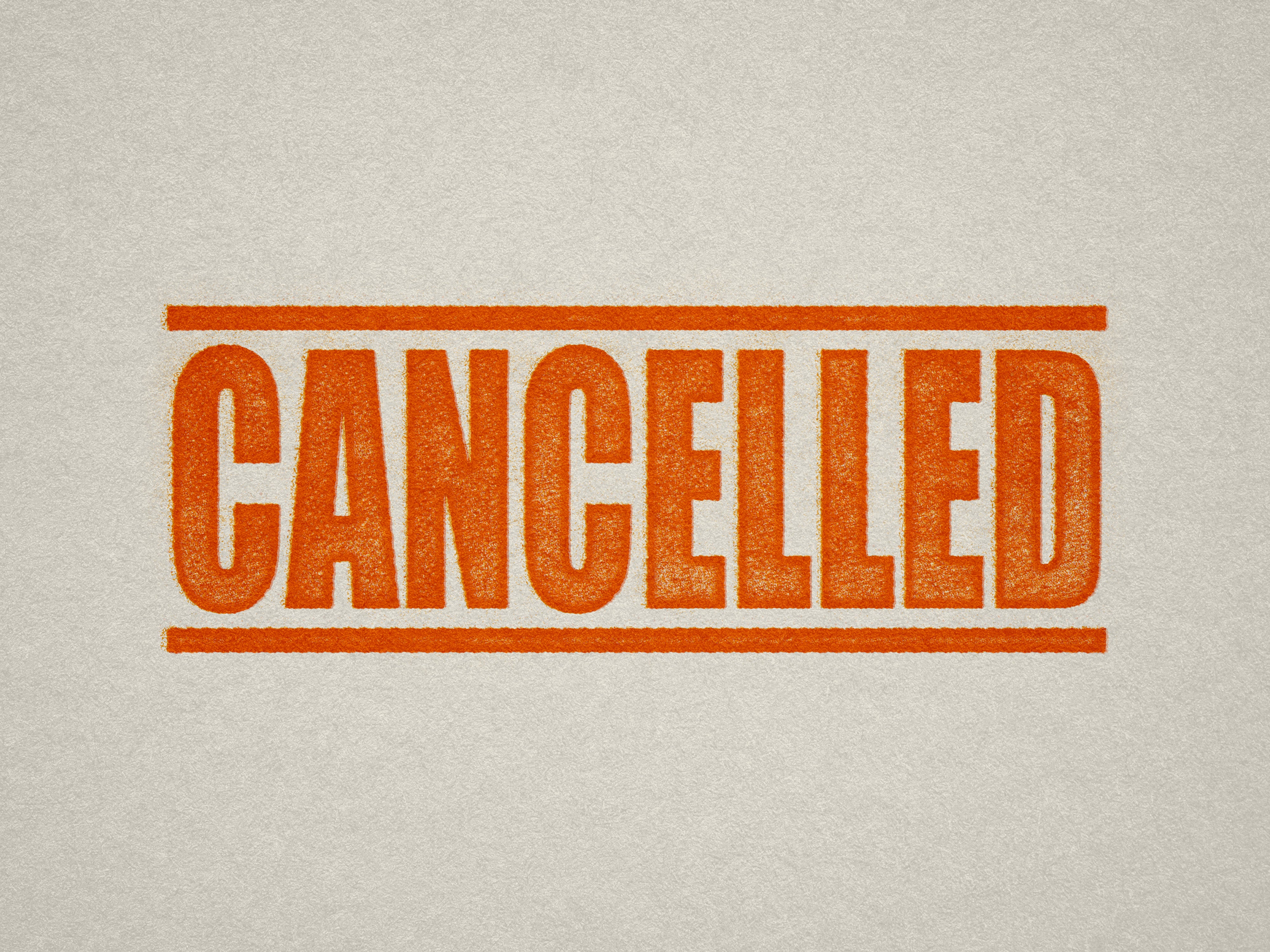 mock up design of 'Cancelled' rubber stamp orange ink in paper background stampers hand stamp office business inventory documents self inking prefill refillable stamps stamping