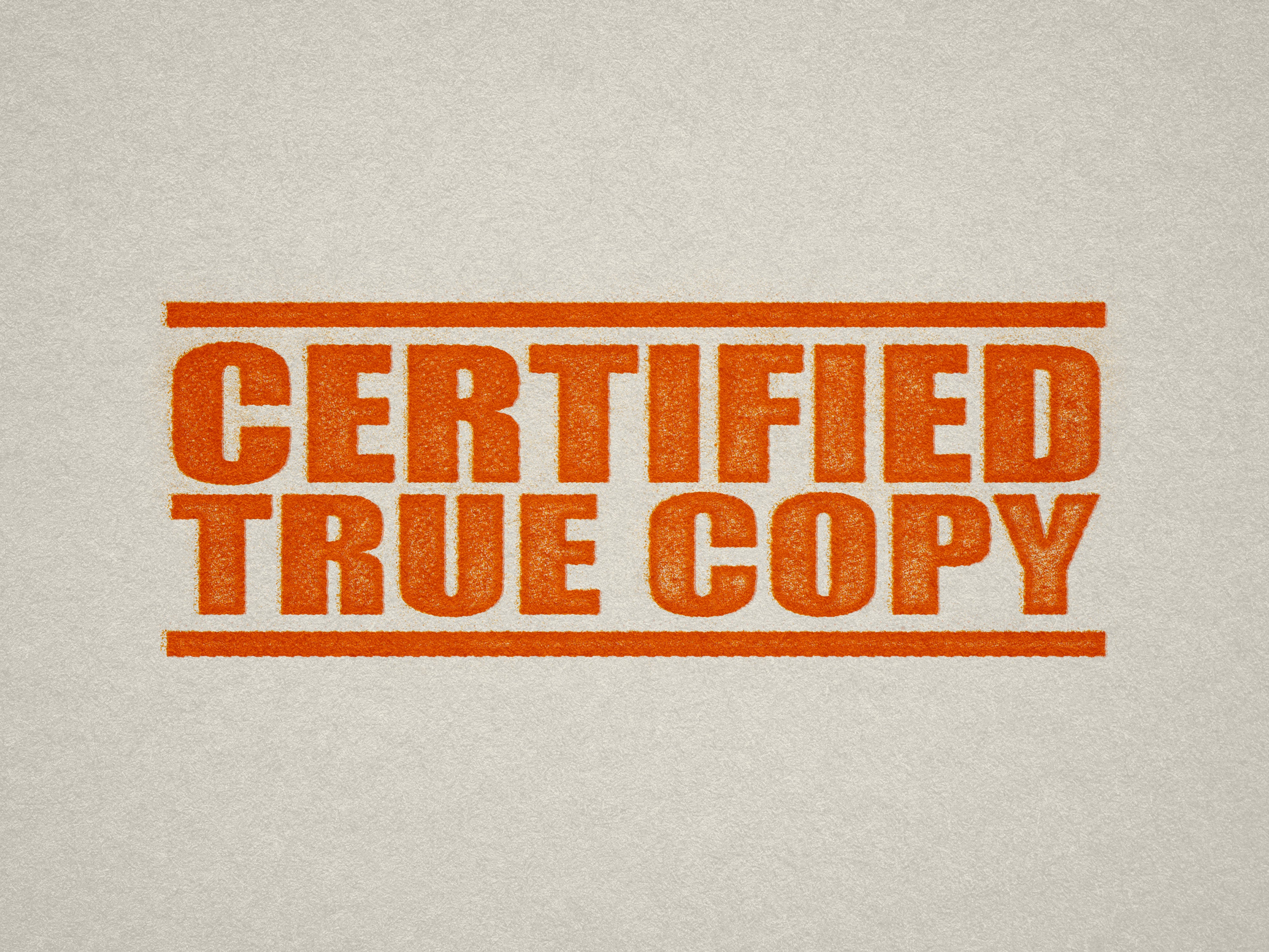 mock up design or lifestyle image of 'Certified True Copy' rubber stamp orange ink in paper background stampers hand stamp office business inventory documents self inking prefill refillable stamps stamping