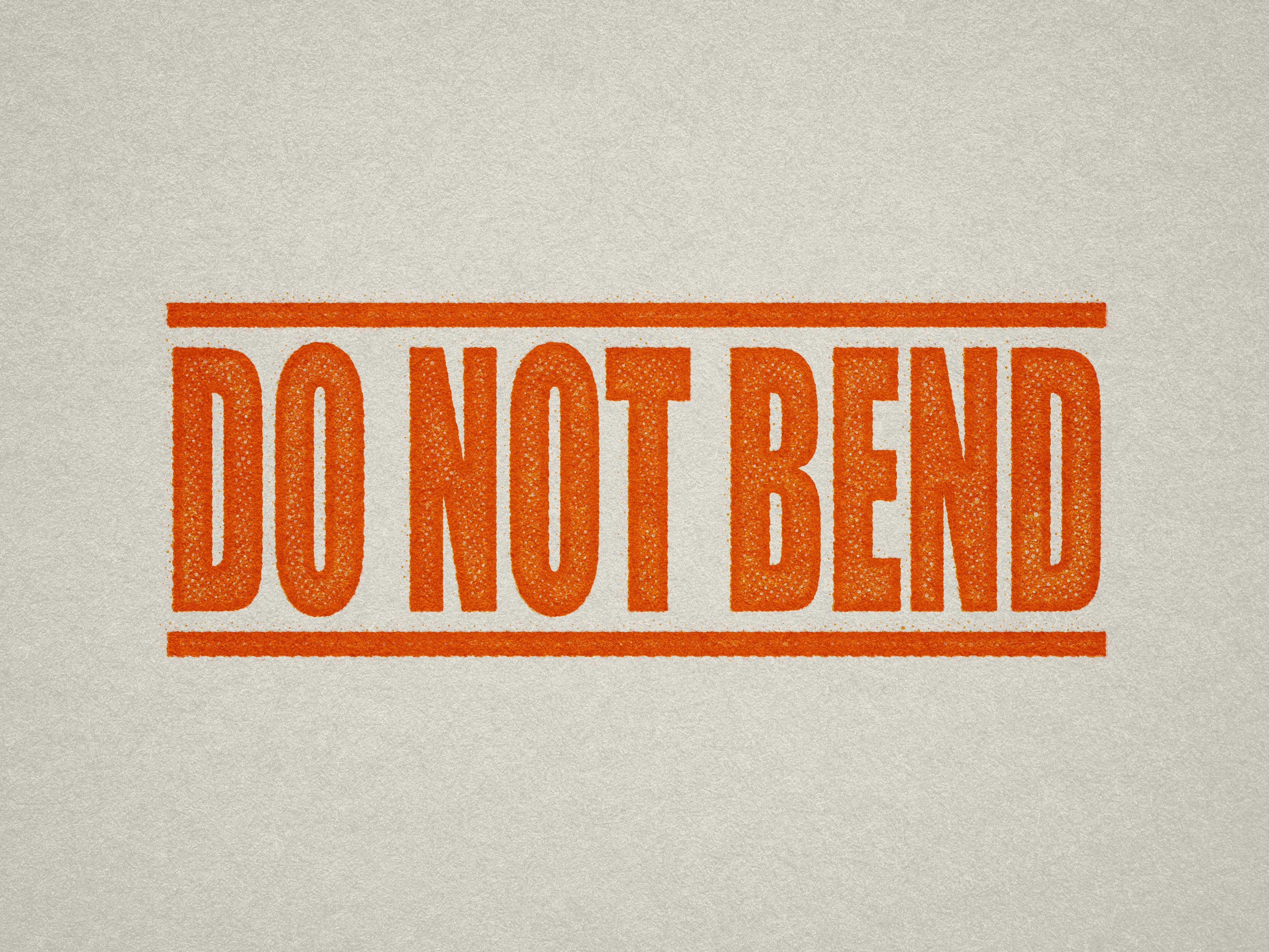 mock up design of DO NOT BEND rubber stamp orange ink in paper background stampers hand stamp office business inventory documents