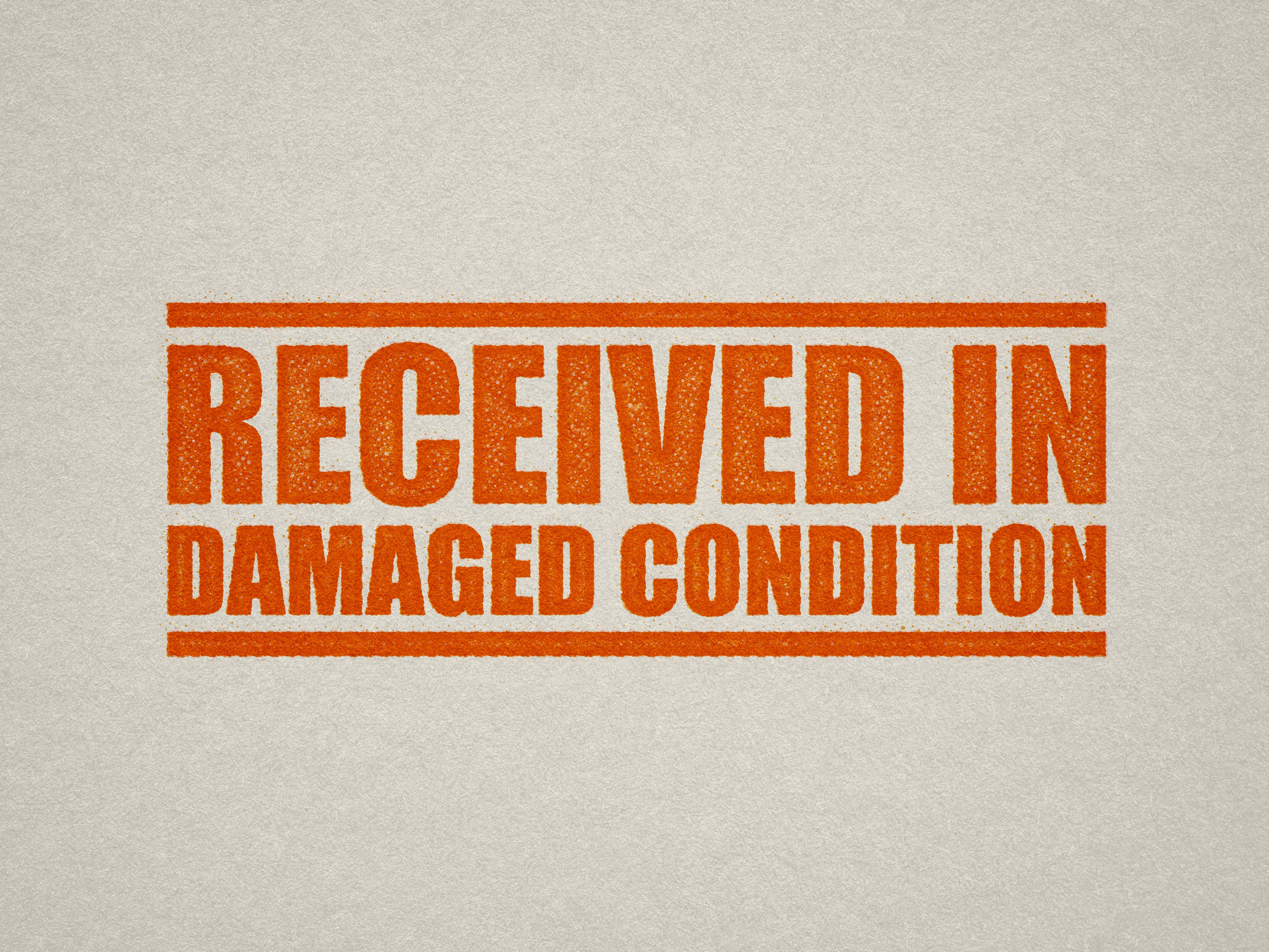 RECEIVED IN DAMAGED CONDITION rubber stamper Orange ink