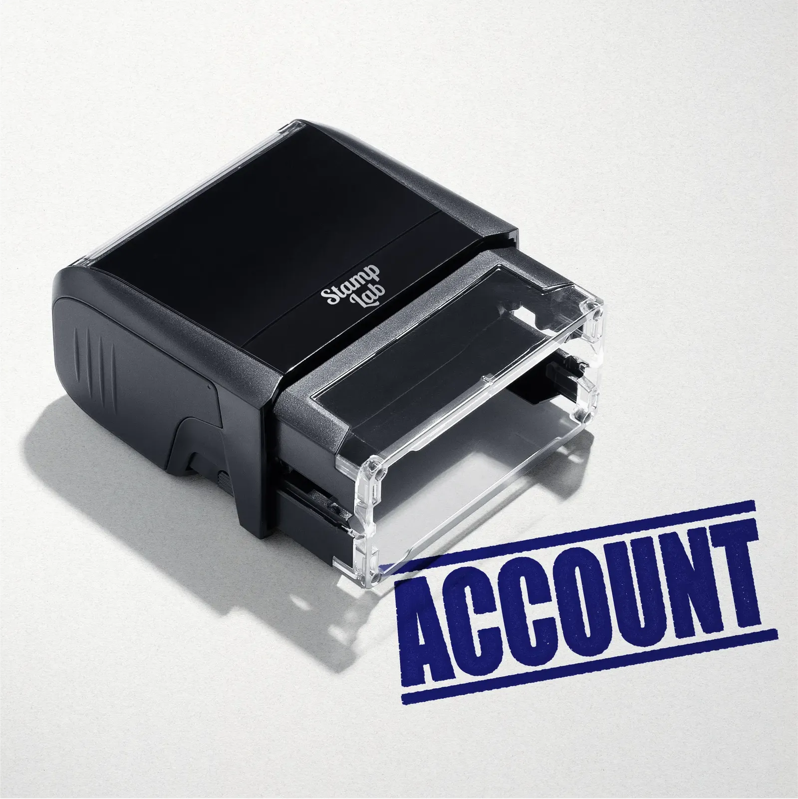 mock up design or lifestyle image of 'Account' rubber stamp blue ink in paper background stampers hand stamp office business inventory documents self inking prefill refillable stamps stamping