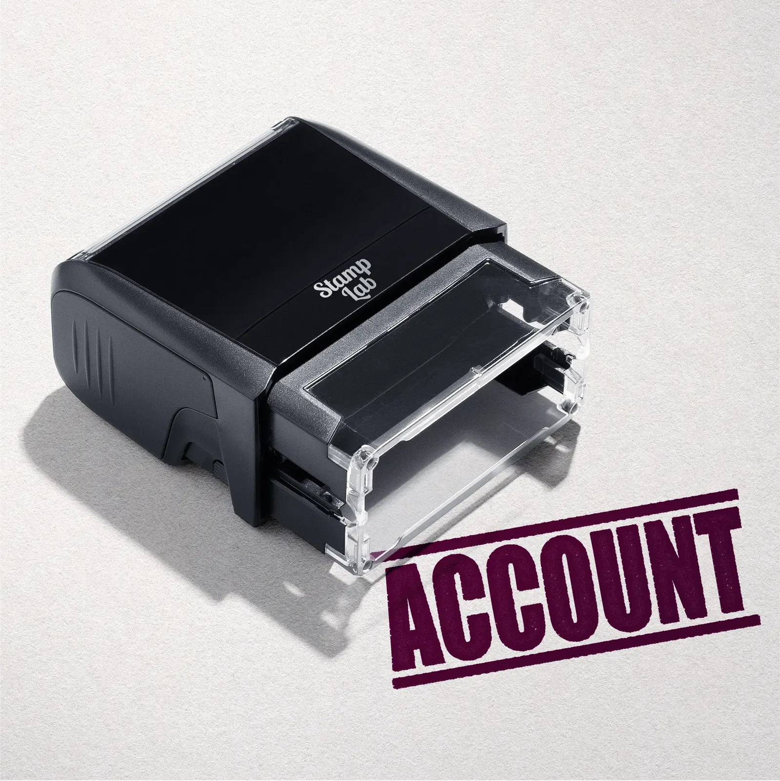 mock up design or lifestyle image of 'Account' rubber stamp maroon ink in paper background stampers hand stamp office business inventory documents self inking prefill refillable stamps stamping