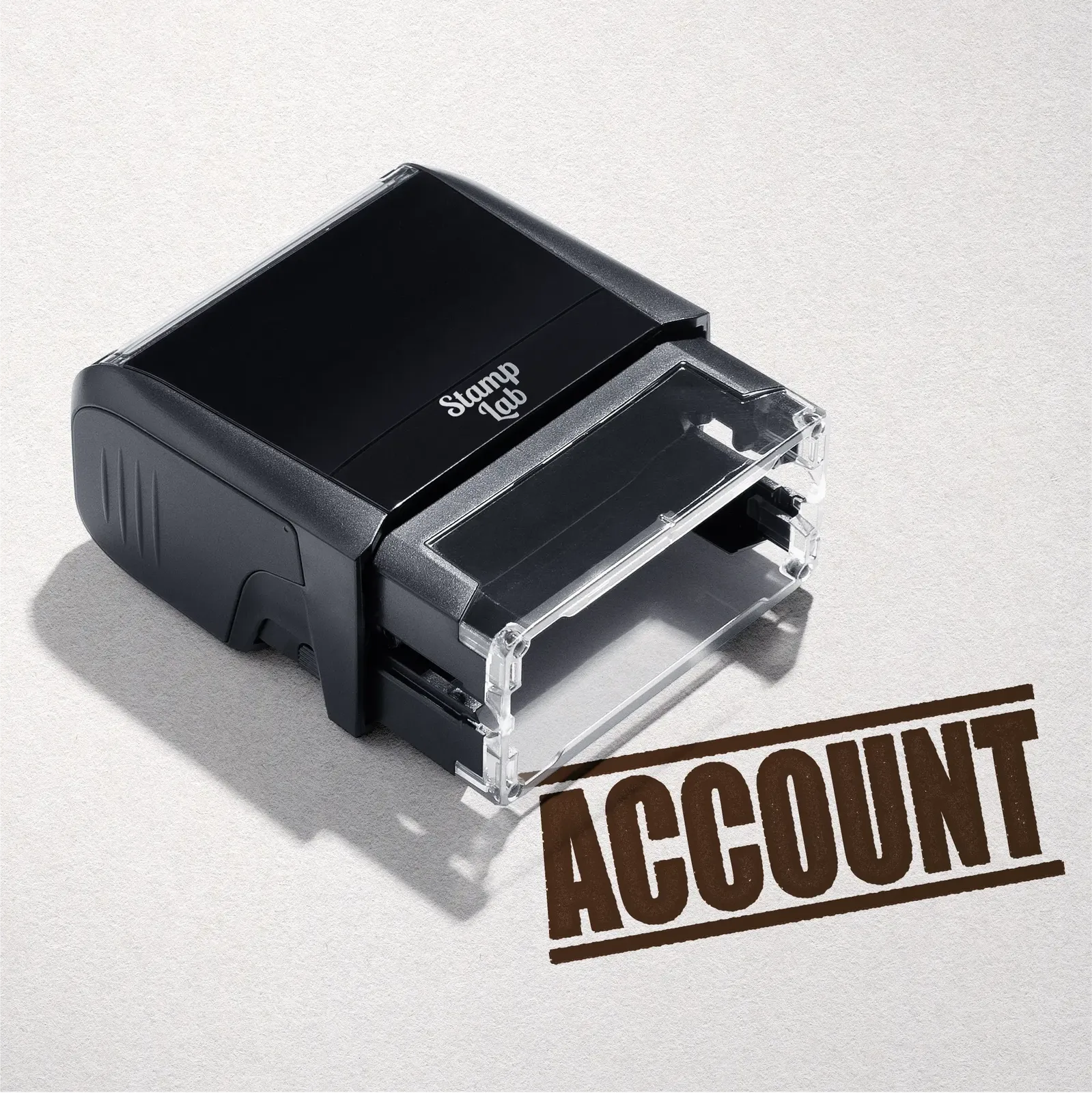 mock up design or lifestyle image of 'Account' rubber stamp brown ink in paper background stampers hand stamp office business inventory documents self inking prefill refillable stamps stamping