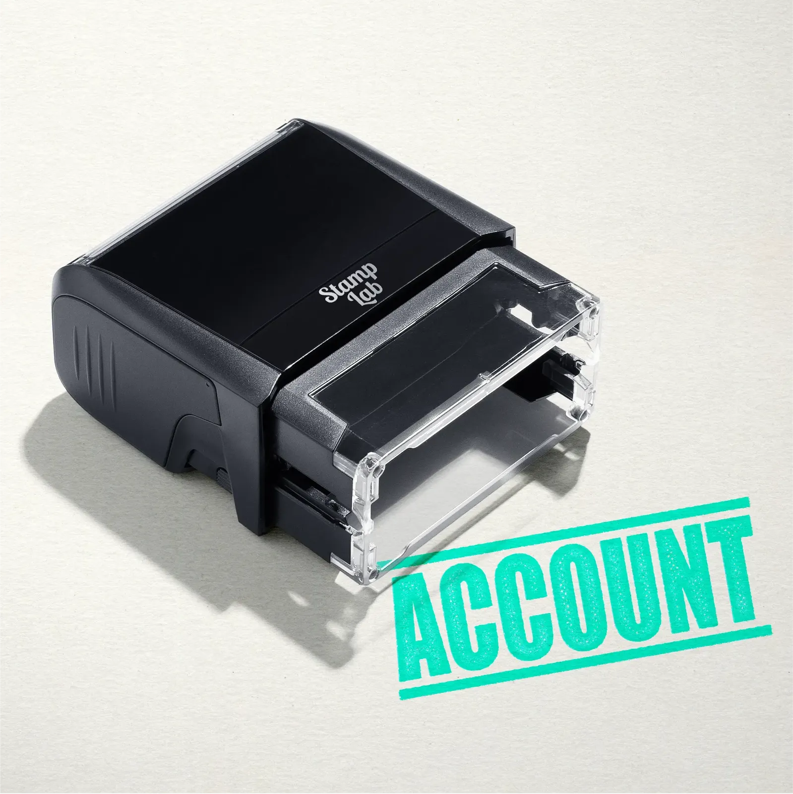 mock up design or lifestyle image of 'Account' rubber stamp mint ink in paper background stampers hand stamp office business inventory documents self inking prefill refillable stamps stamping