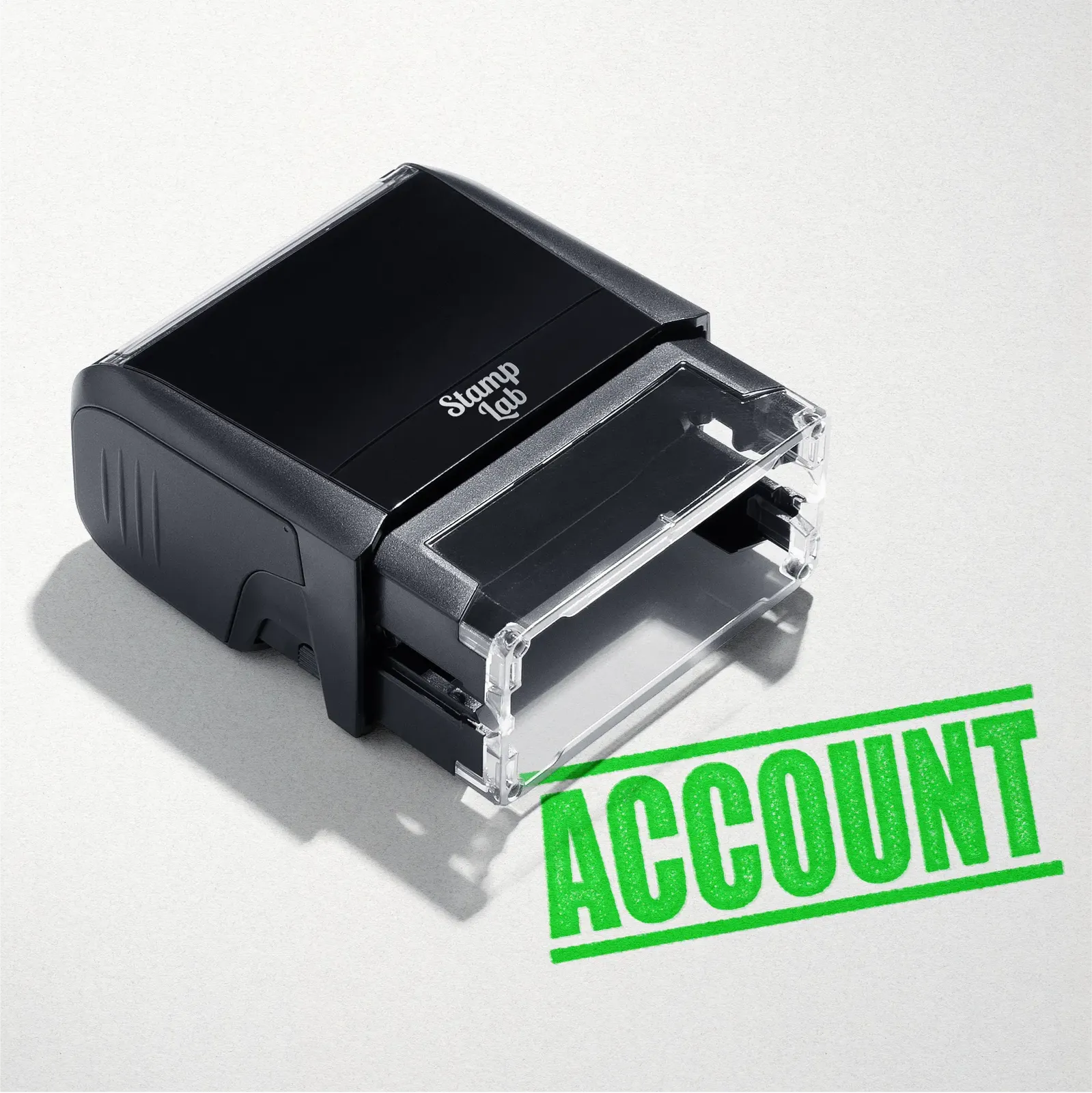 mock up design or lifestyle image of 'Account' rubber stamp apple green ink in paper background stampers hand stamp office business inventory documents self inking prefill refillable stamps stamping