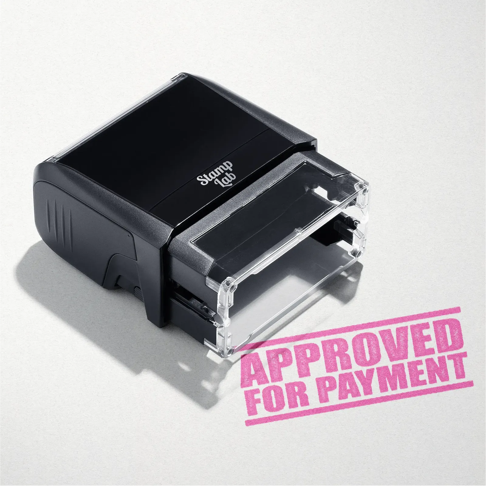 mock up design of 'Approved For Payment" rubber stamp pink ink in paper background stampers hand stamp office business inventory documents