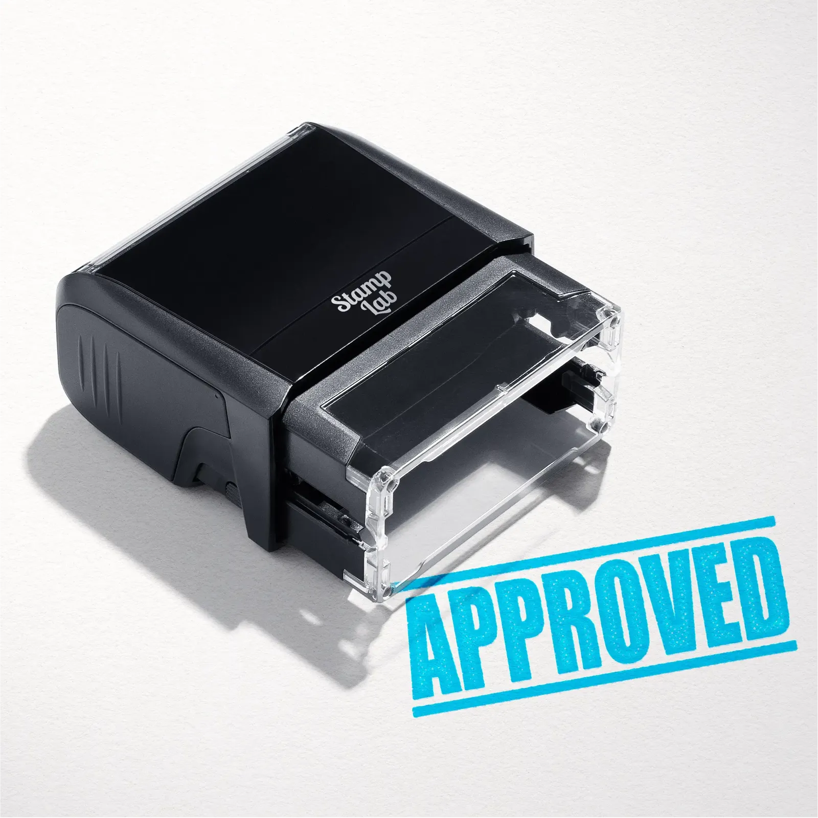 "Mock up design or lifestyle image of 'APPROVED' rubber stamp turquoise ink in paper background stampers hand stamp office business inventory documents sky blue
"