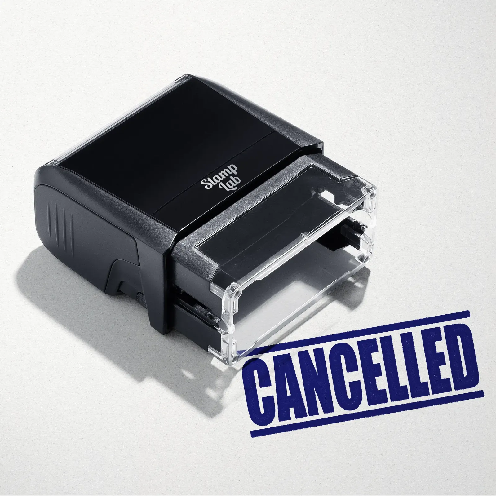 mock up design or lifestyle image of 'Cancelled' rubber stamp blue ink in paper background stampers hand stamp office business inventory documents self inking prefill refillable stamps stamping