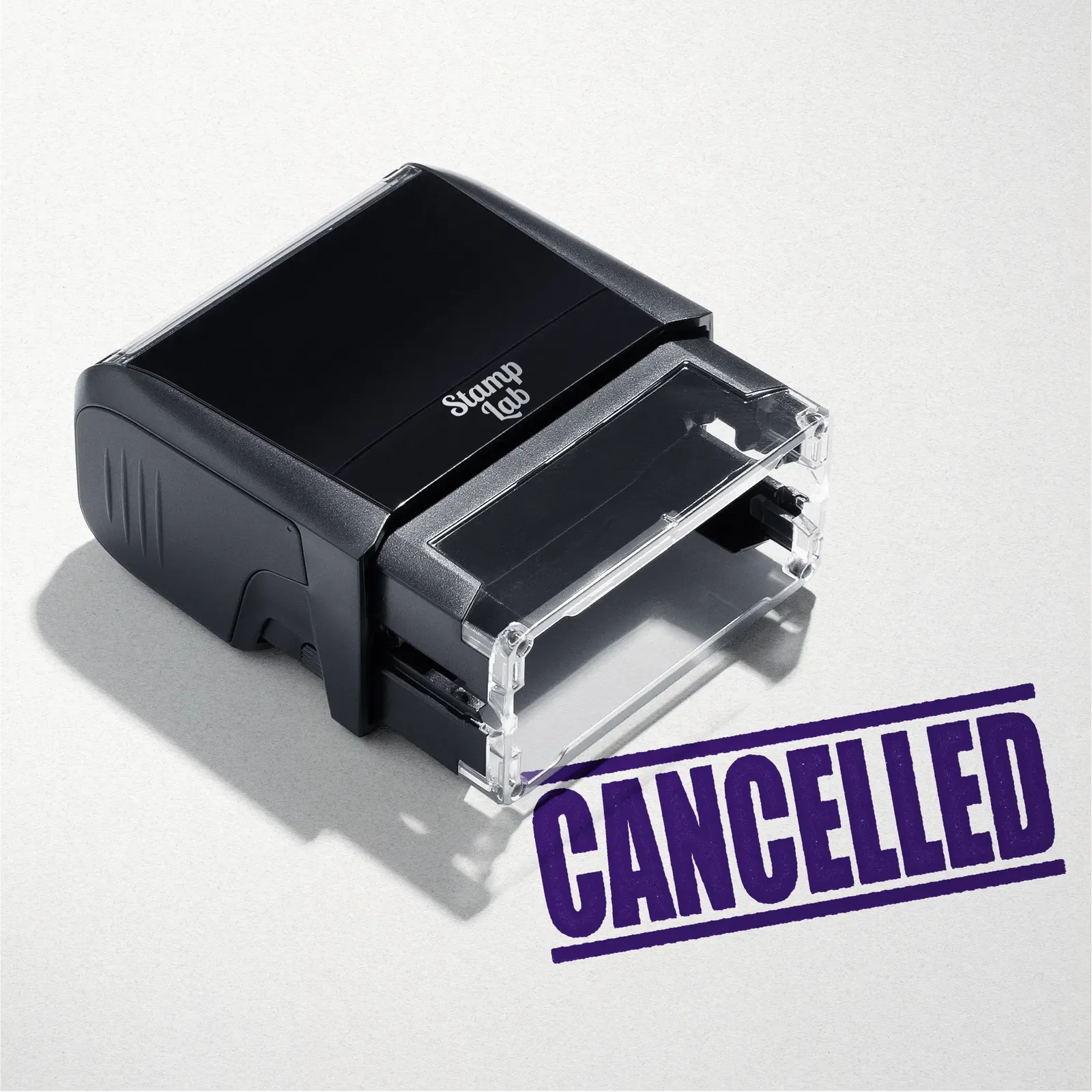 mock up design or lifestyle image of 'Cancelled' rubber stamp violet ink in paper background stampers hand stamp office business inventory documents self inking prefill refillable stamps stamping purple