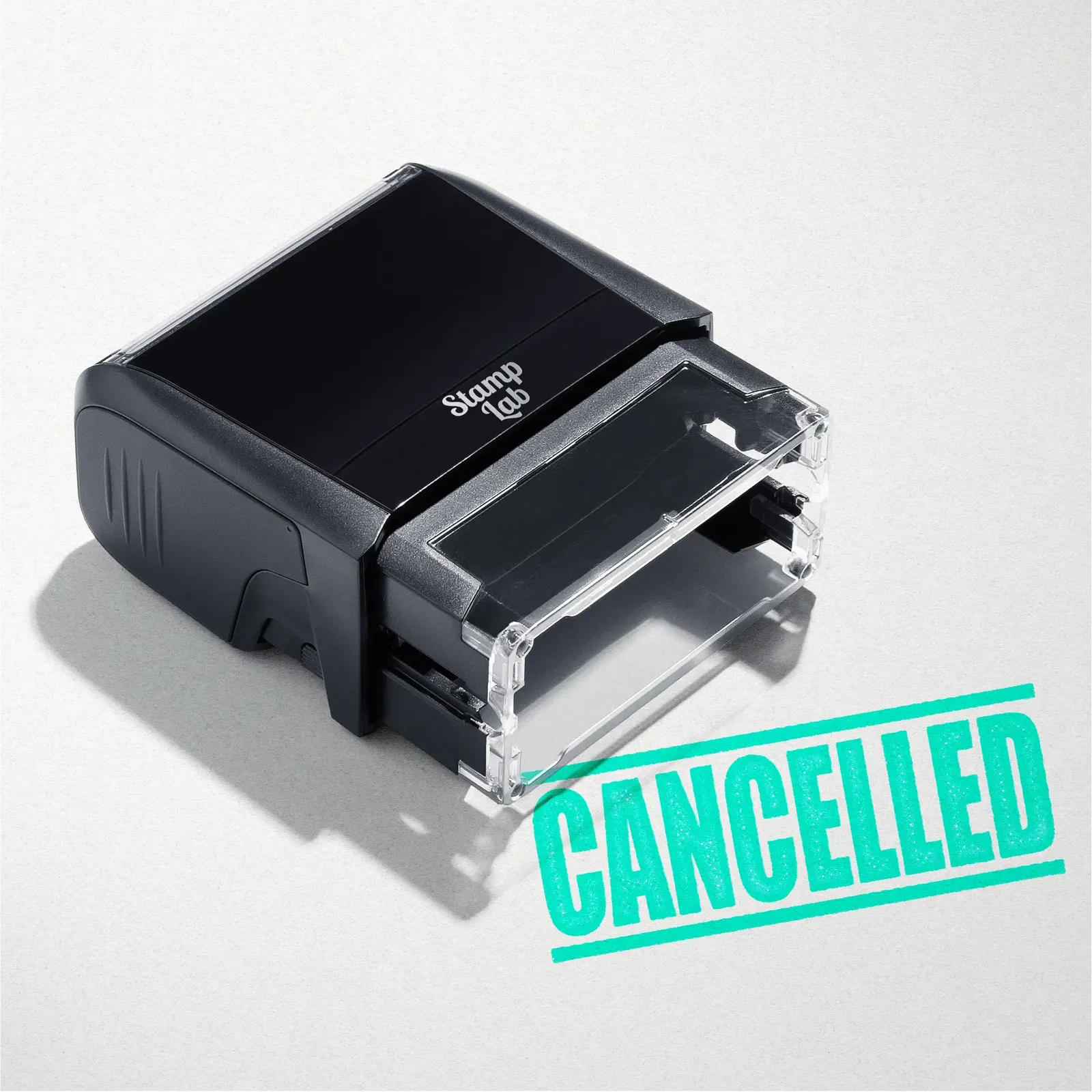 mock up design or lifestyle image of 'Cancelled' rubber stamp mint ink in paper background stampers hand stamp office business inventory documents self inking prefill refillable stamps stamping