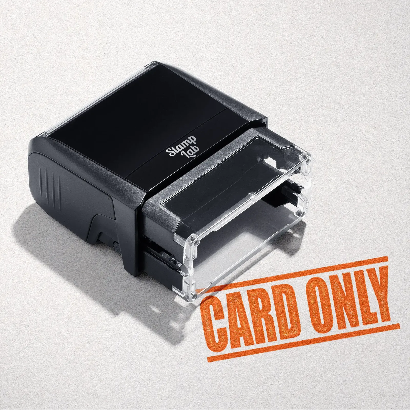 mock up design or lifestyle image of 'Card Only' rubber stamp orange ink in paper background stampers hand stamp office business inventory documents