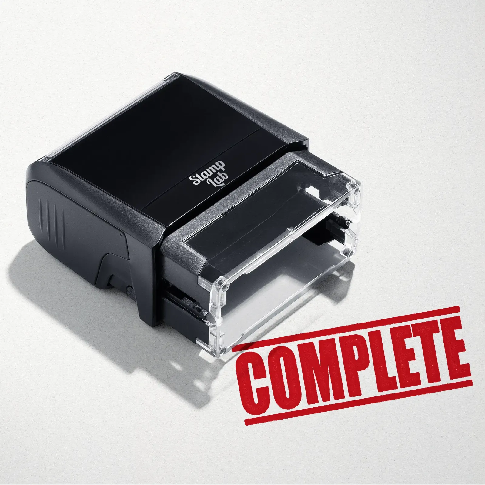 mock up design or lifestyle image of 'Complete' rubber stamp red ink in paper background stampers hand stamp office business inventory documents