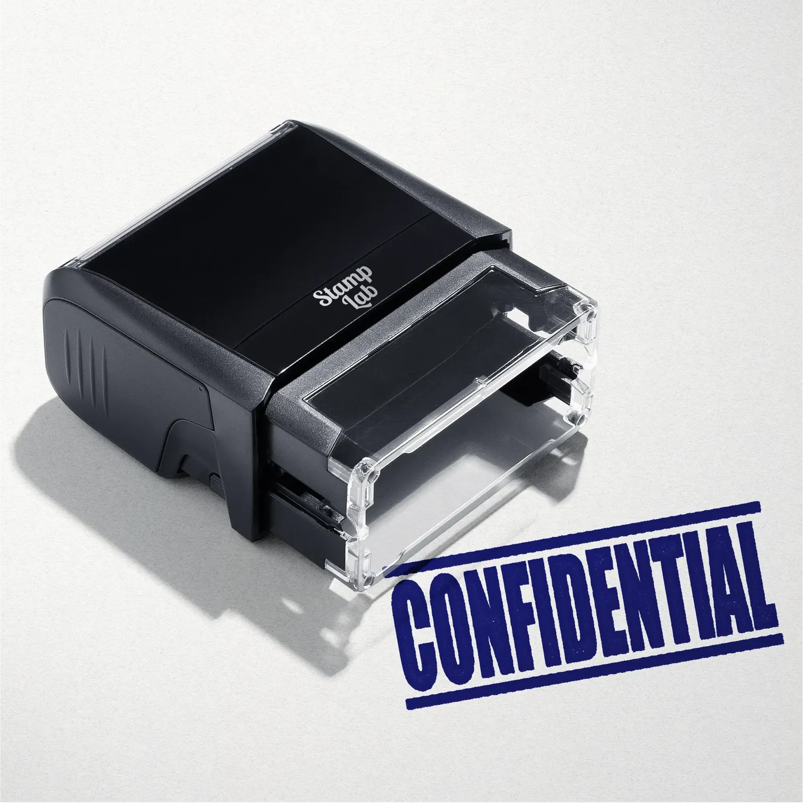 mock up design or lifestyle image of 'Confidential' rubber stamp blue ink in paper background stampers hand stamp office business inventory documents self inking prefill refillable stamps stamping