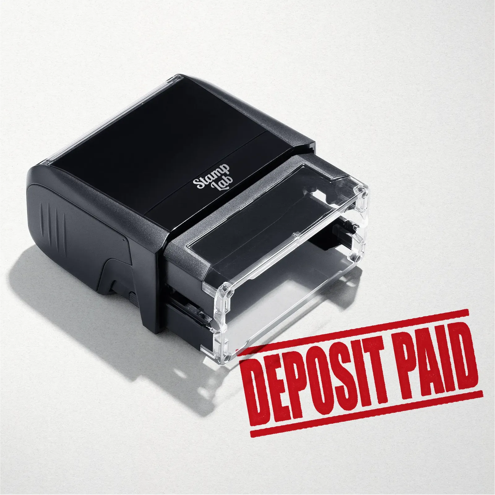 mock up design or lifestyle image of 'Deposit Paid' rubber stamp red ink in paper background stampers hand stamp office business inventory documents self inking prefill refillable stamps stamping