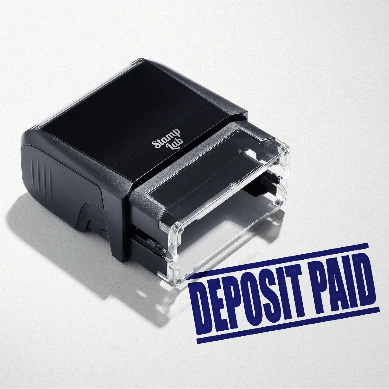 mock up design or lifestyle image of 'Deposit Paid' rubber stamp blue ink in paper background stampers hand stamp office business inventory documents self inking prefill refillable stamps stamping