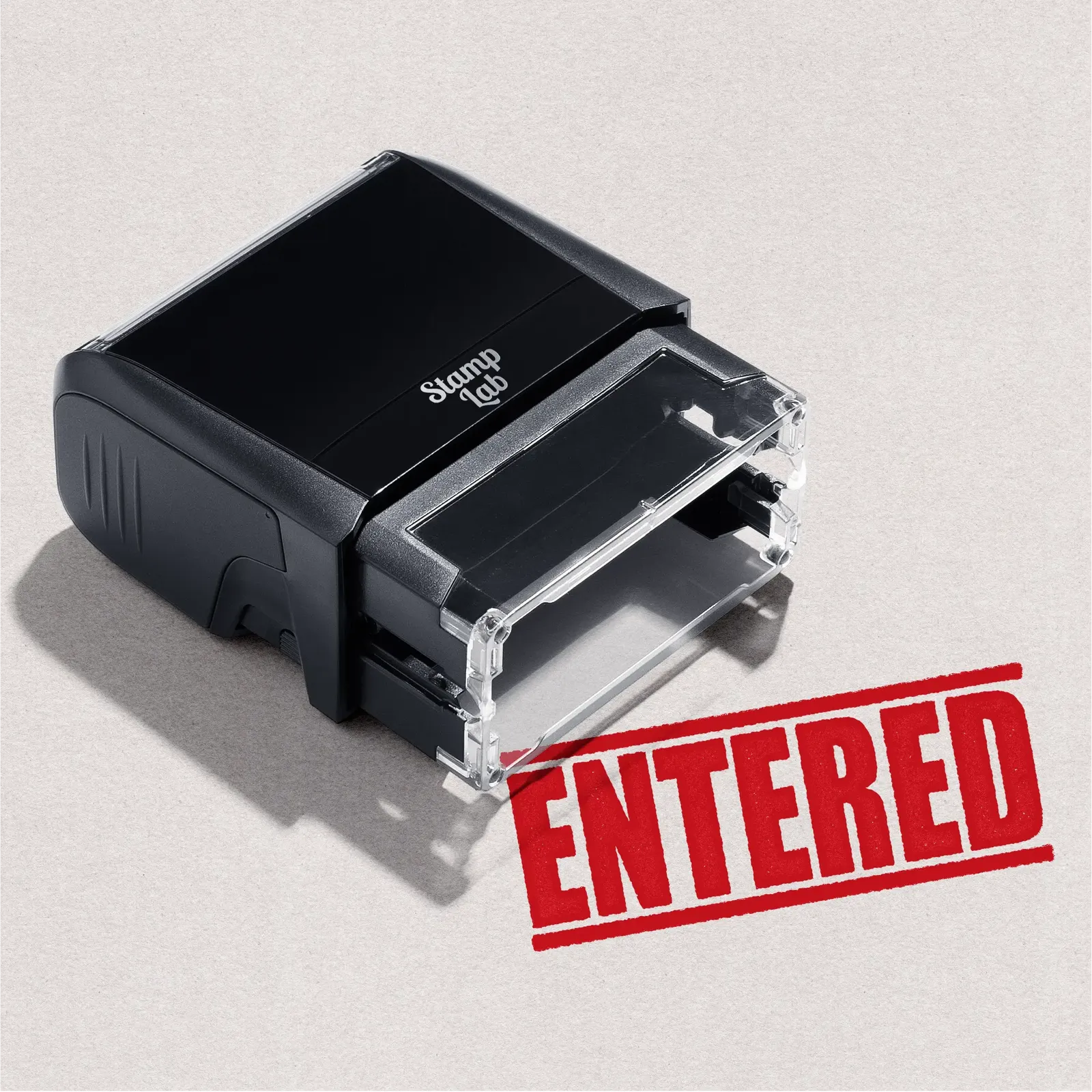 Mock up design or lifestyle image of 'ENTERED' rubber stamp red ink in paper background stampers hand stamp office business inventory documents red