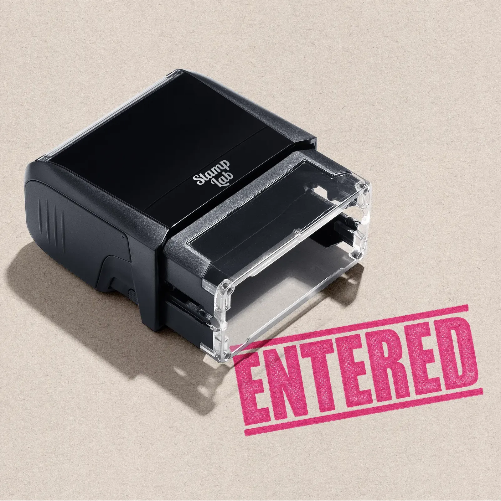 Mock up design or lifestyle image of 'ENTERED' rubber stamp pink ink in paper background stampers hand stamp office business inventory documents pink