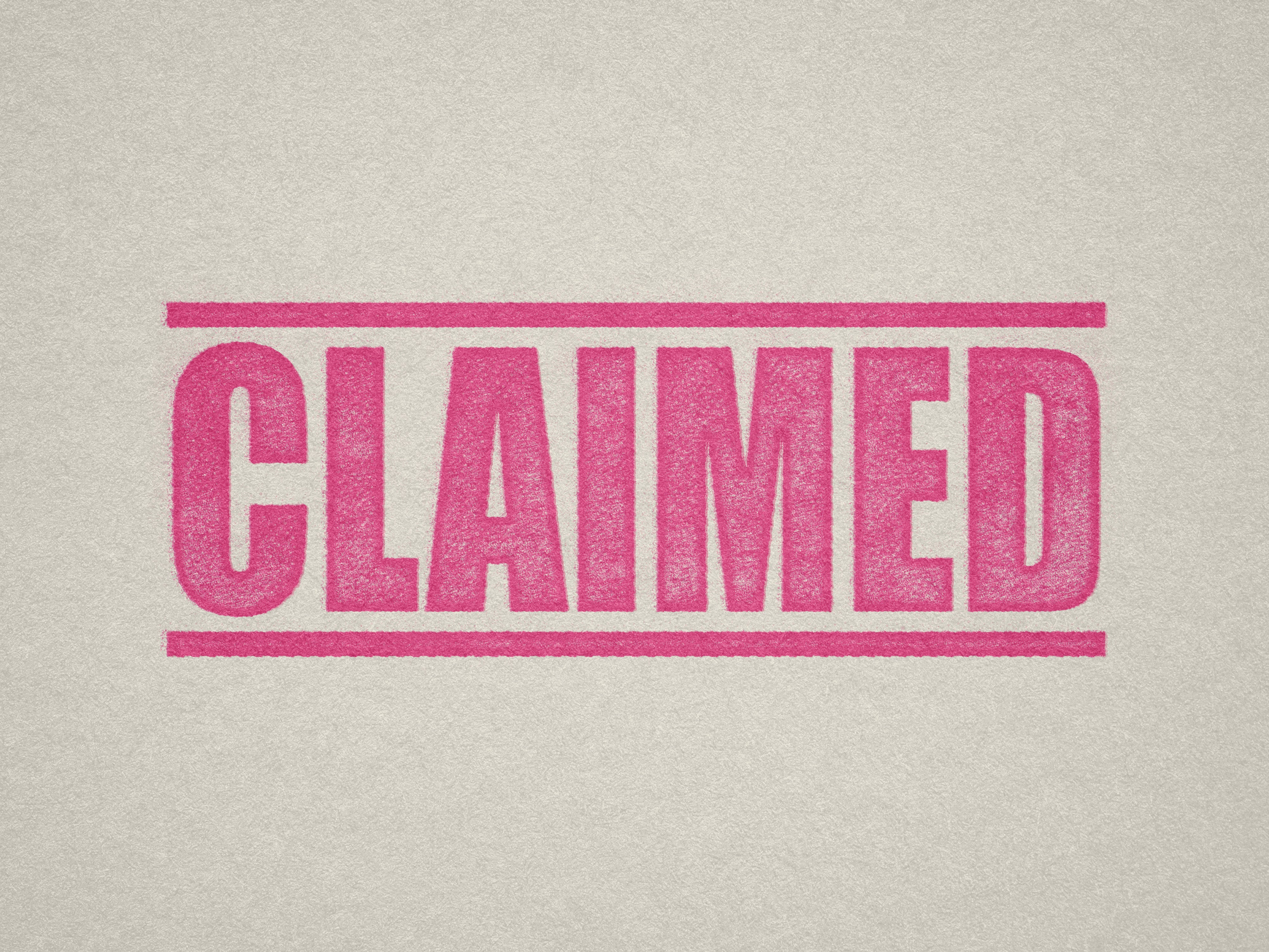 mock up design of 'Claimed' rubber stamp pink ink in paper background stampers hand stamp office business inventory documents self inking prefill refillable stamps stamping