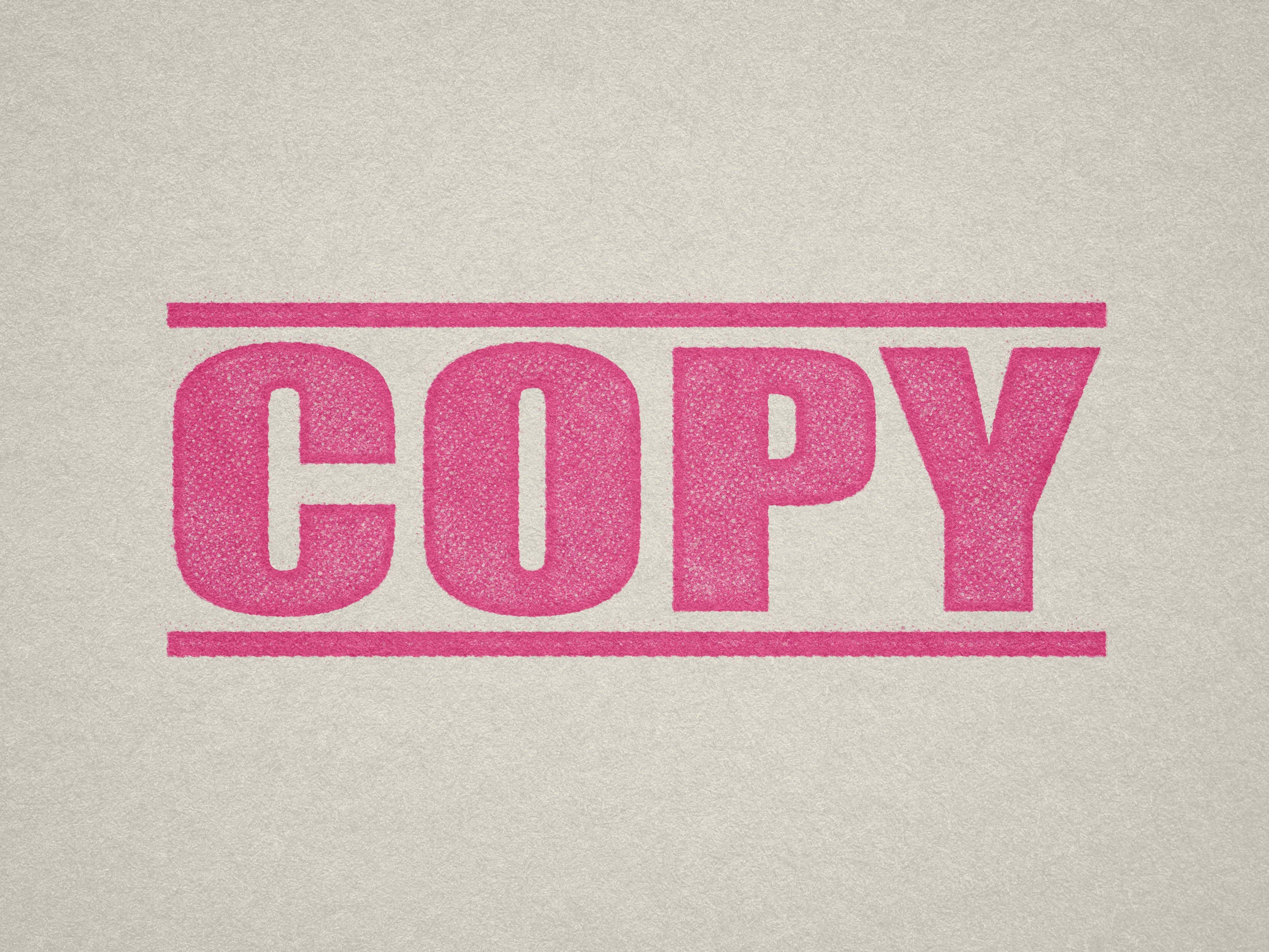 Mock up design or lifestyle image of 'COPY' rubber stamp pink ink in paper background stampers hand stamp office business inventory documents self inking prefill refillable stamps stamping