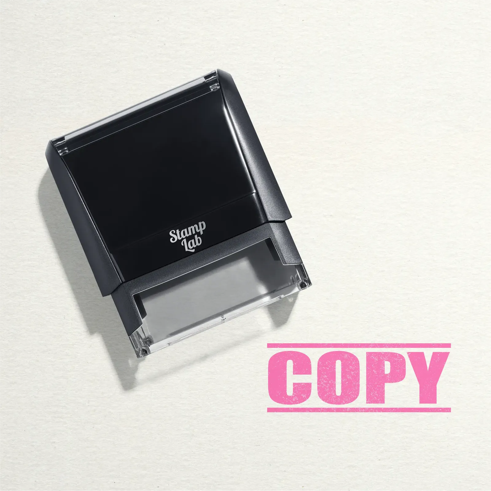 "Mock up design or lifestyle image of 'COPY' rubber stamp pink ink in paper background stampers hand stamp office business inventory documents pink
"
