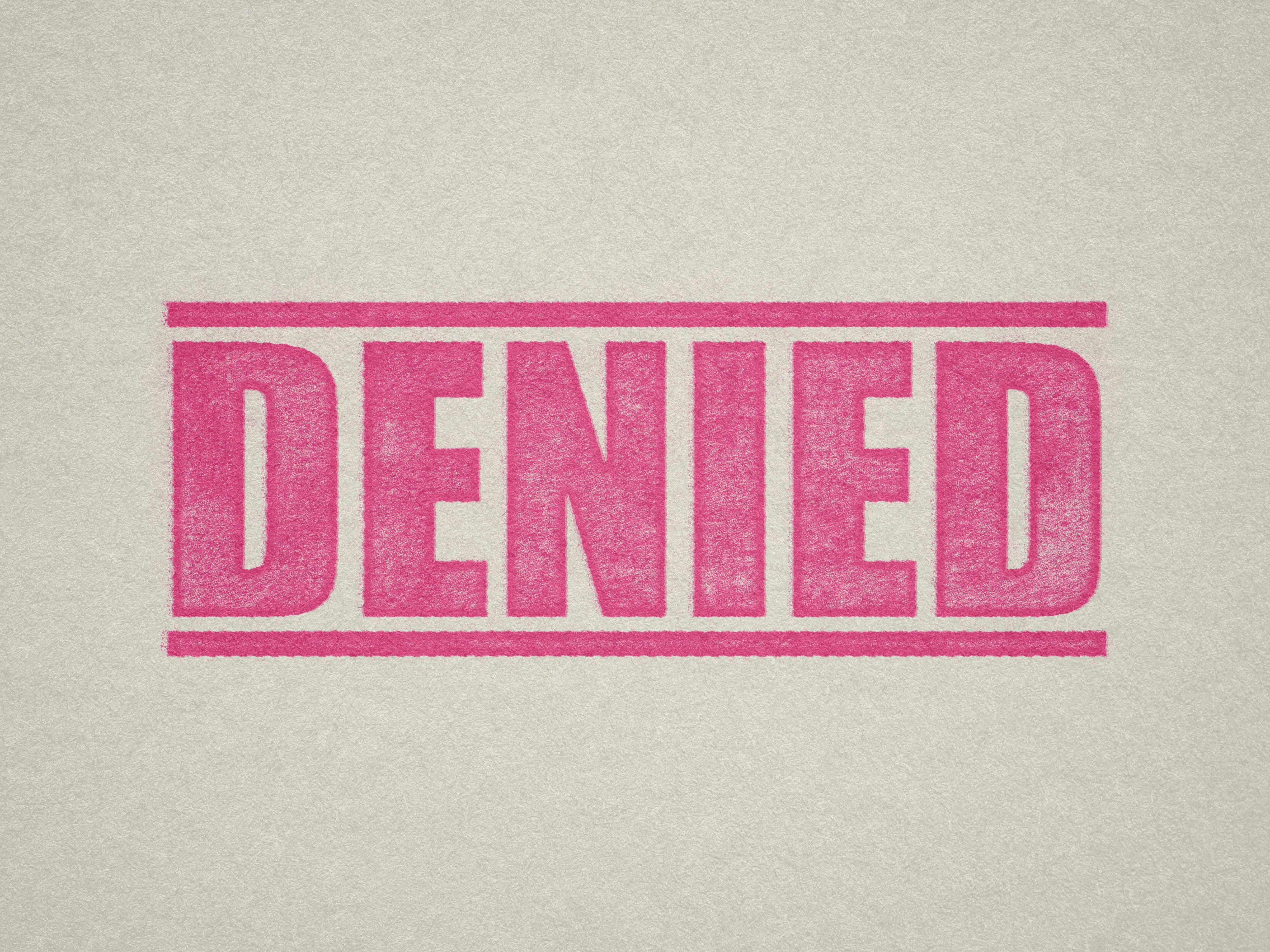 mock up design or lifestyle image of 'Denied' rubber stamp pink ink in paper background stampers hand stamp office business inventory documents self inking prefill refillable stamps stamping