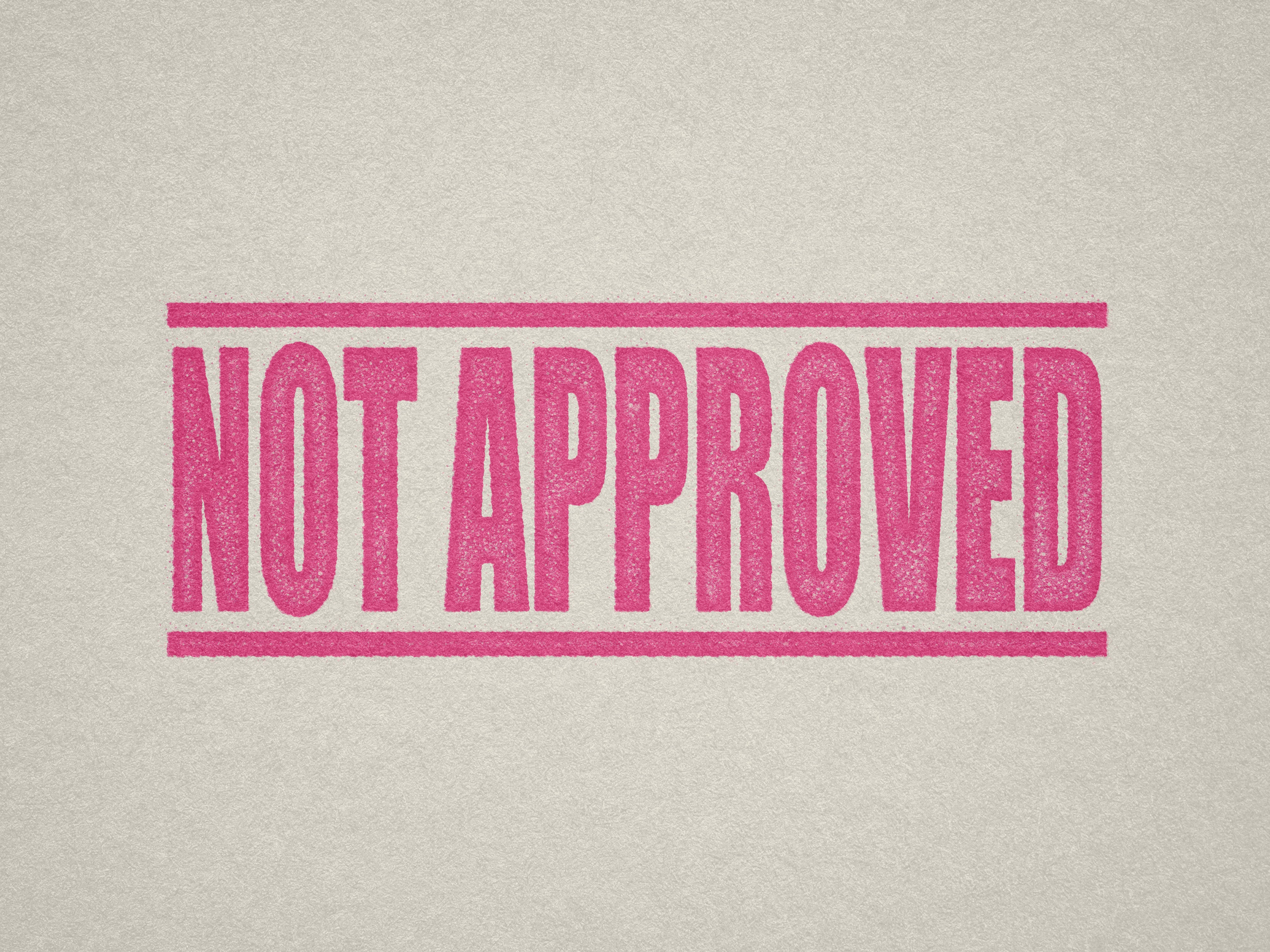 mock up design of 'Not Approved' rubber stamp pink ink in paper background stampers hand stamp office business inventory documents self inking prefill refillable stamps stamping