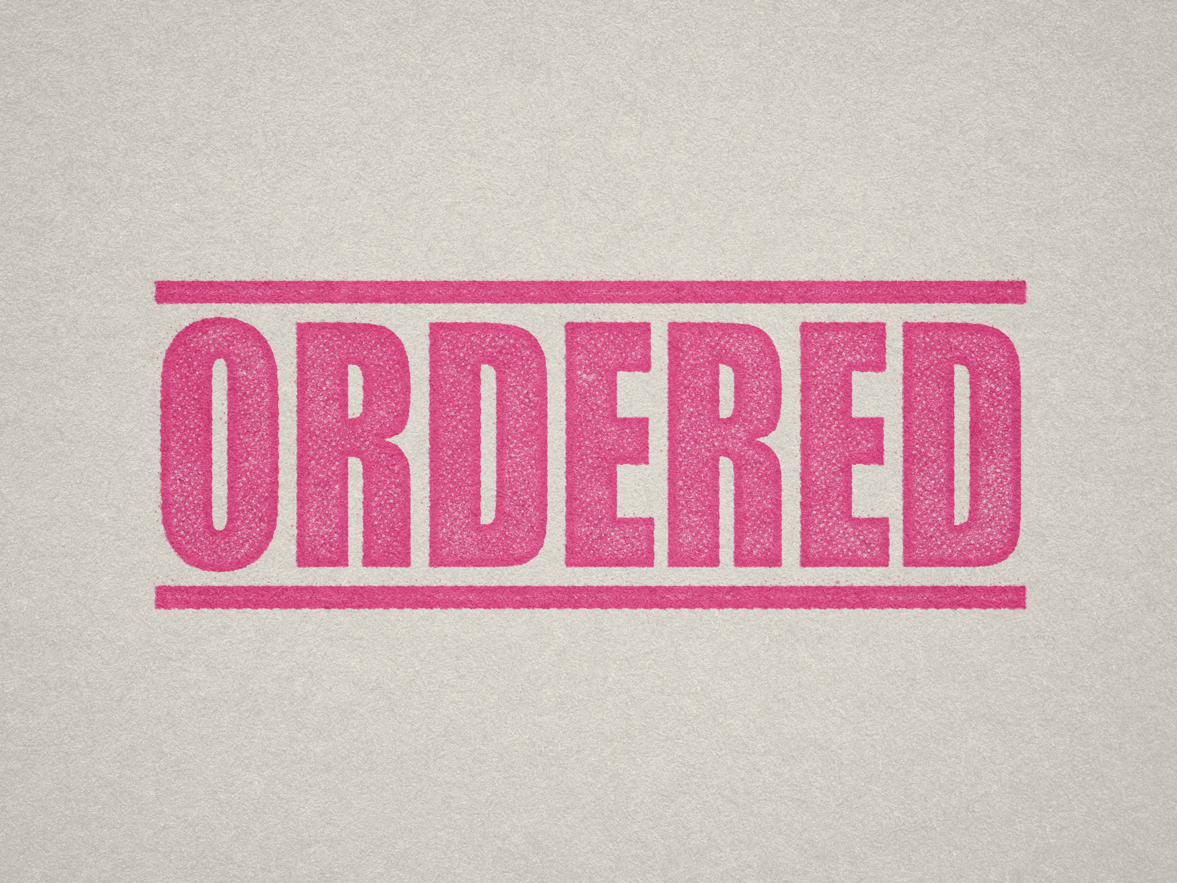 Mock up design or lifestyle image of 'ORDERED' rubber stamp pink ink in paper background stampers hand stamp office business inventory documents self inking prefill refillable stamps stamping