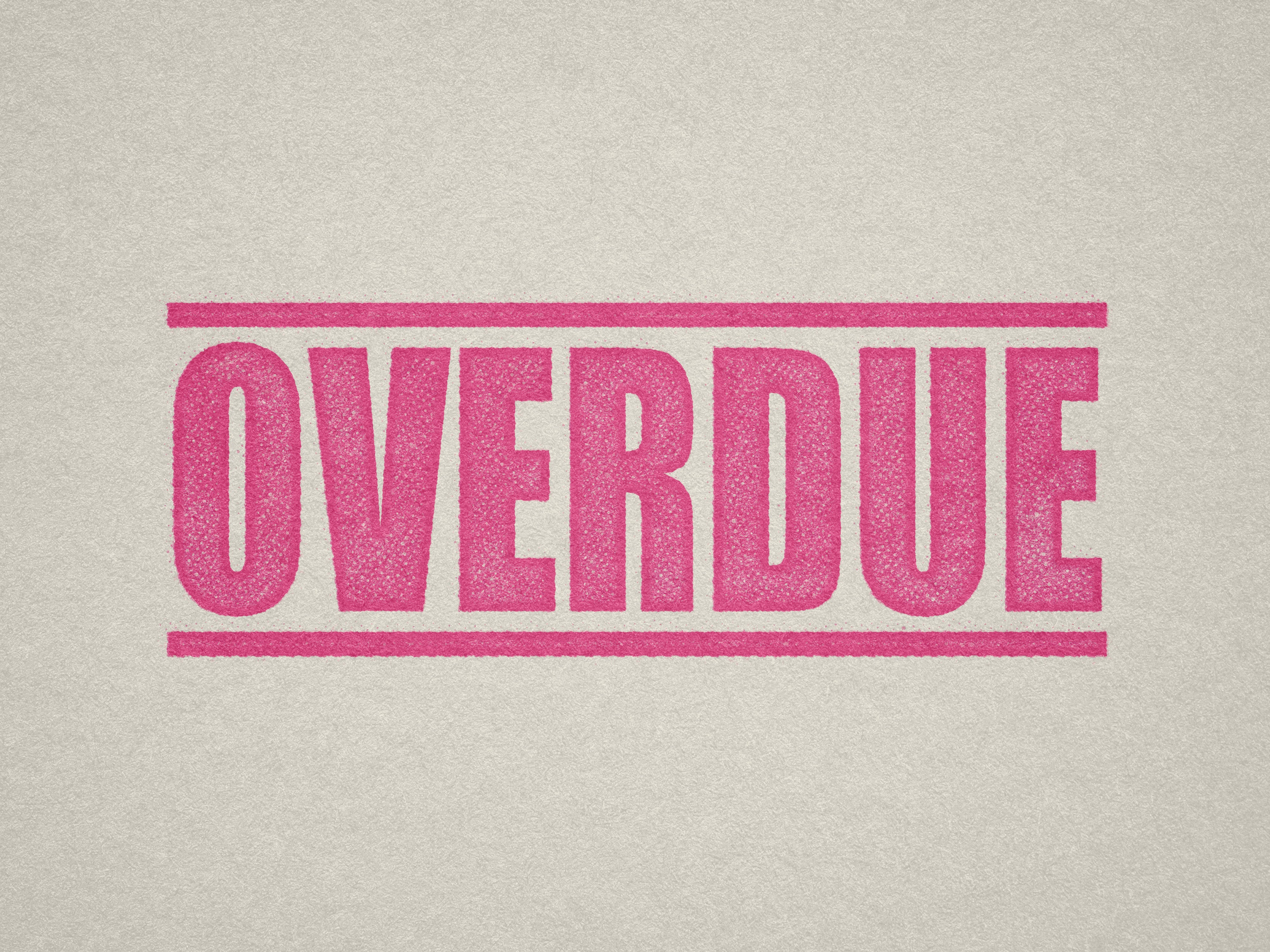 A pink self inking rubber stamp with the word 'Overdue ' printed in bold capital letters in pink ink. stampers hand stamp office business inventory documents